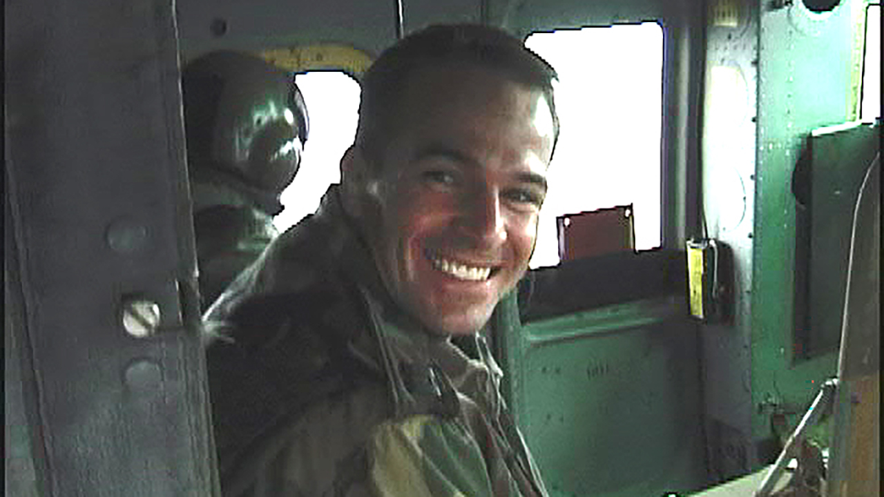 Todd Virgil in a helicopter