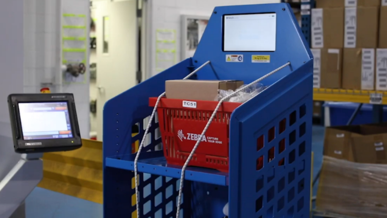  A Fetch Robotics cart helps with picking in a warehouse