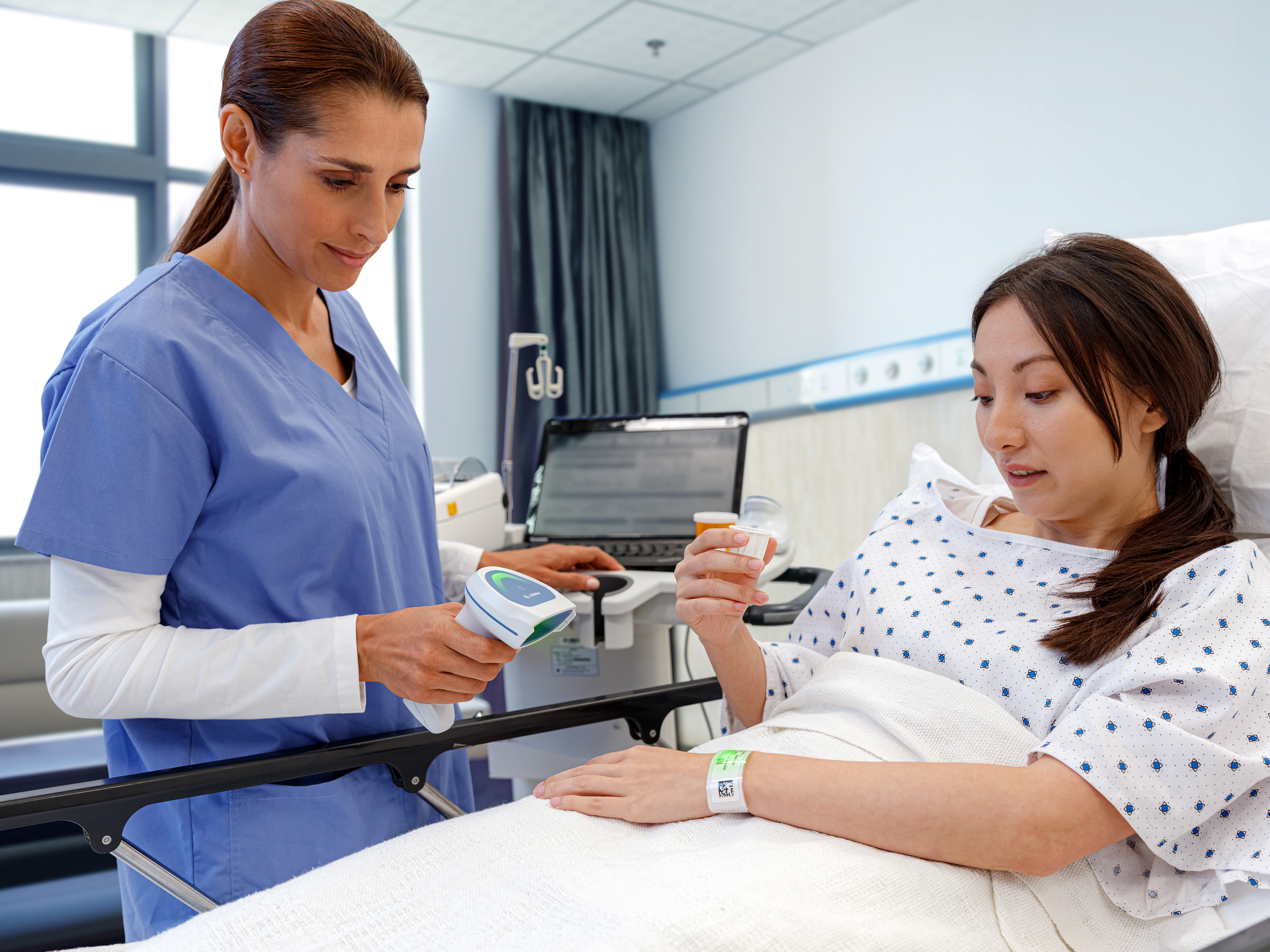 Healthcare Medication Administration at Bedside with wrist scan