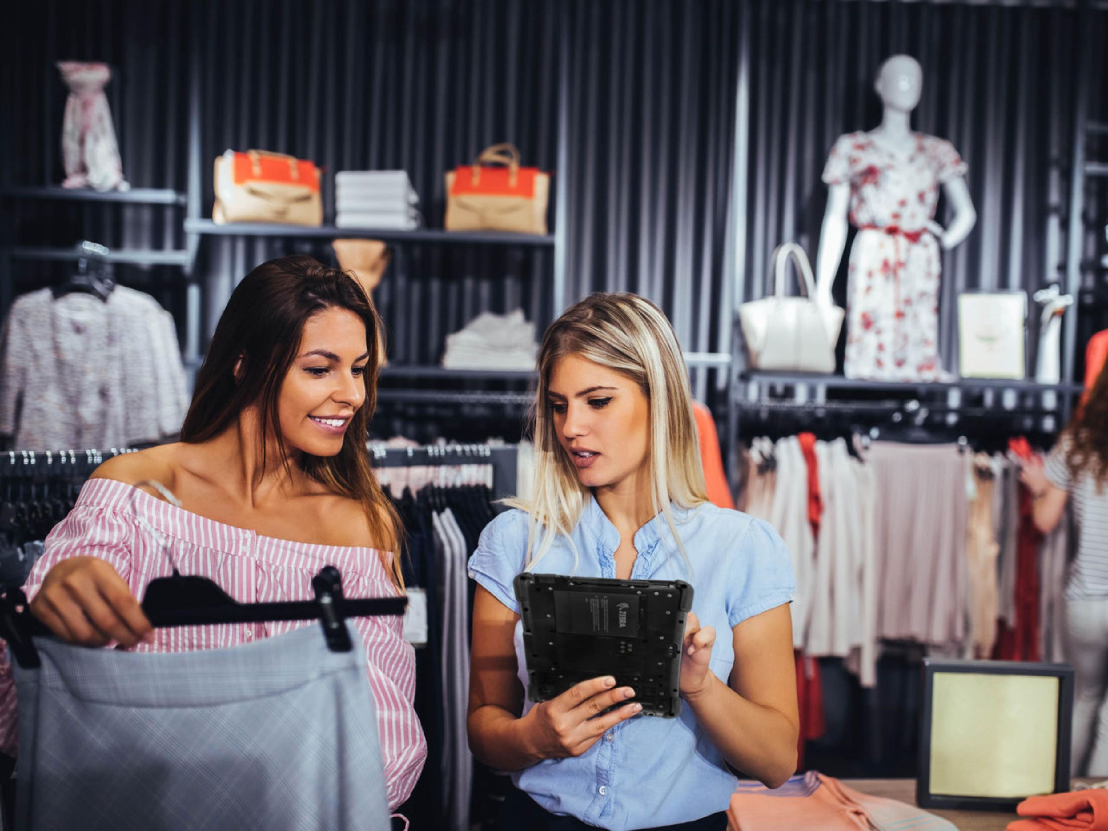 Two women in a retail store