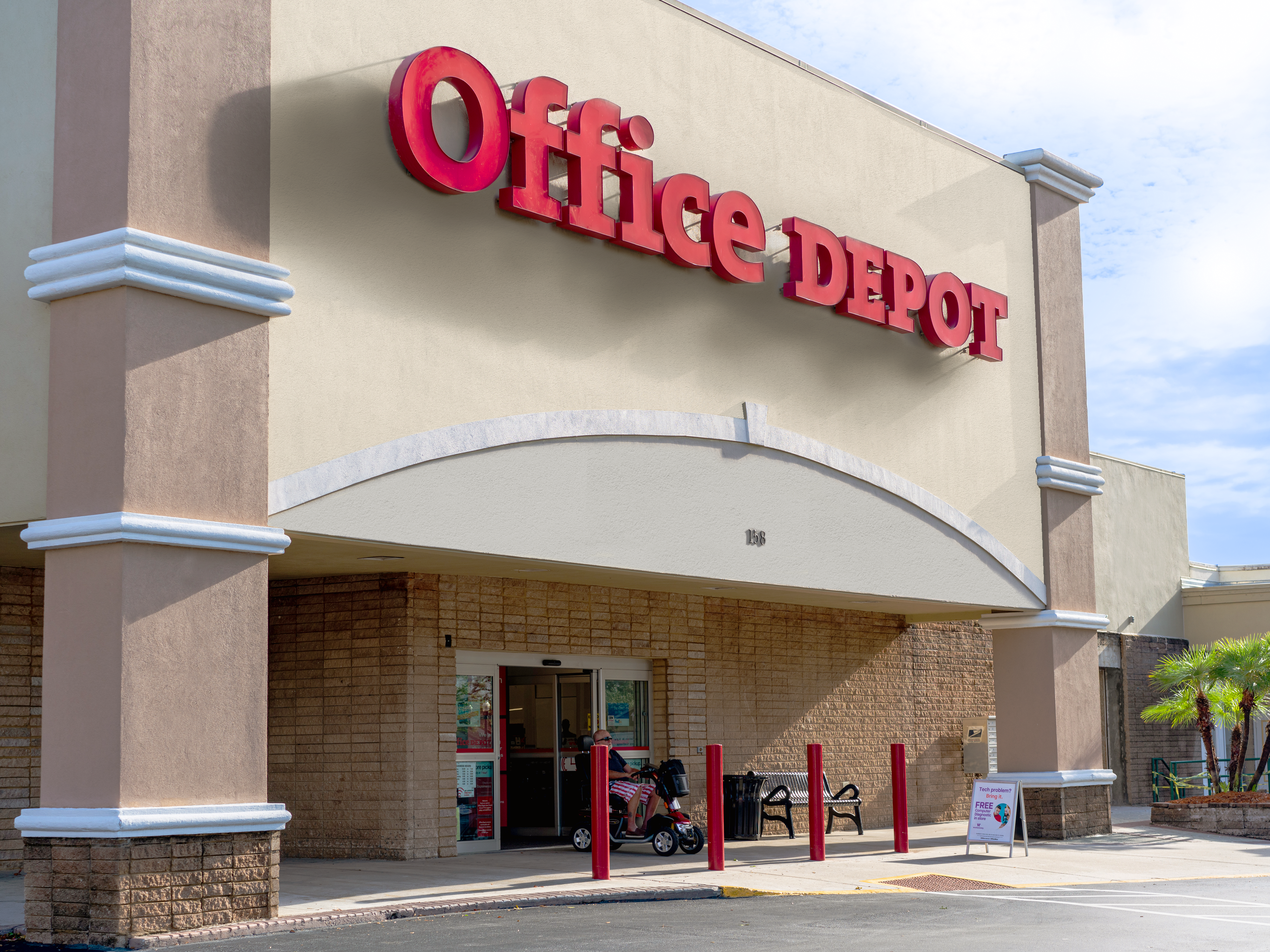 Exterior view of an Office Depot retail store on a sunny day