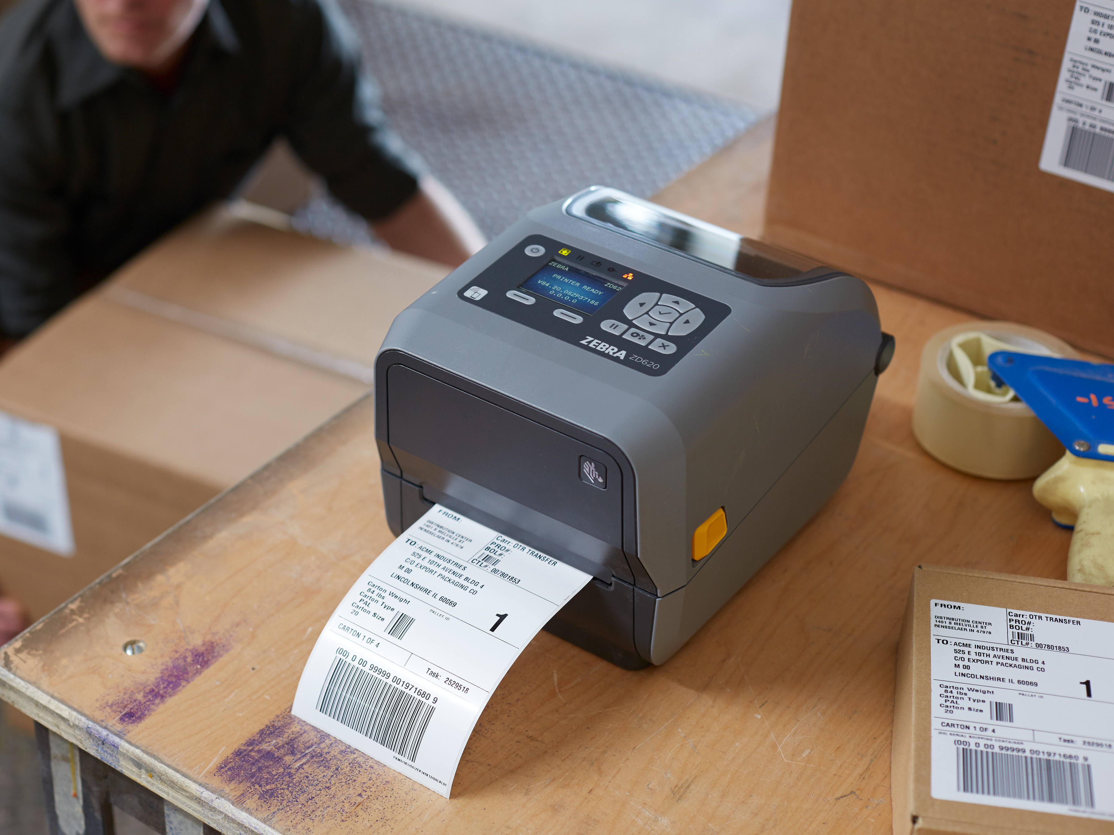 Zebra desktop printer prints out a shipping label