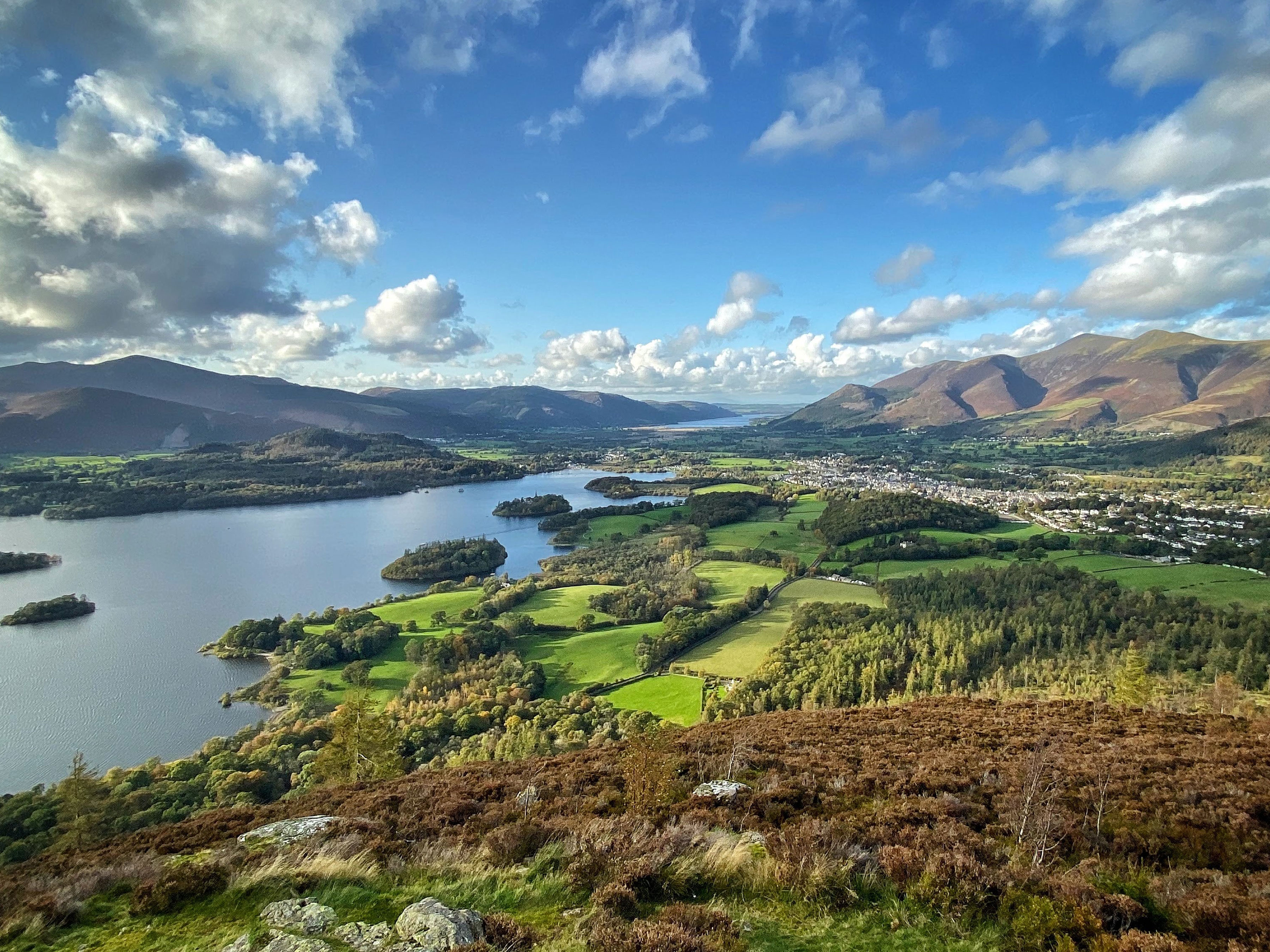 Photograph of a lake nestled between two mountains