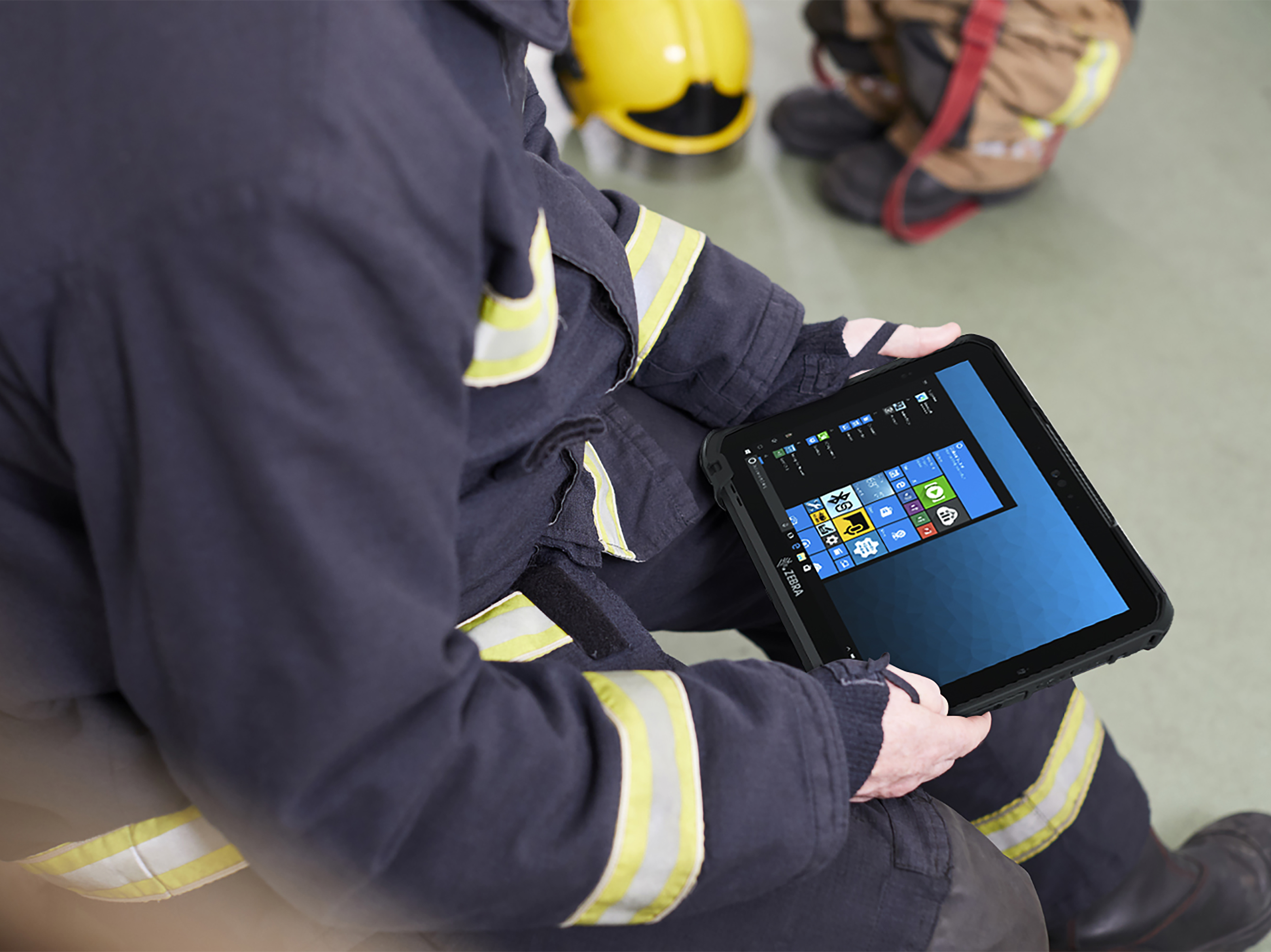 Fireman with Zebra's tablet