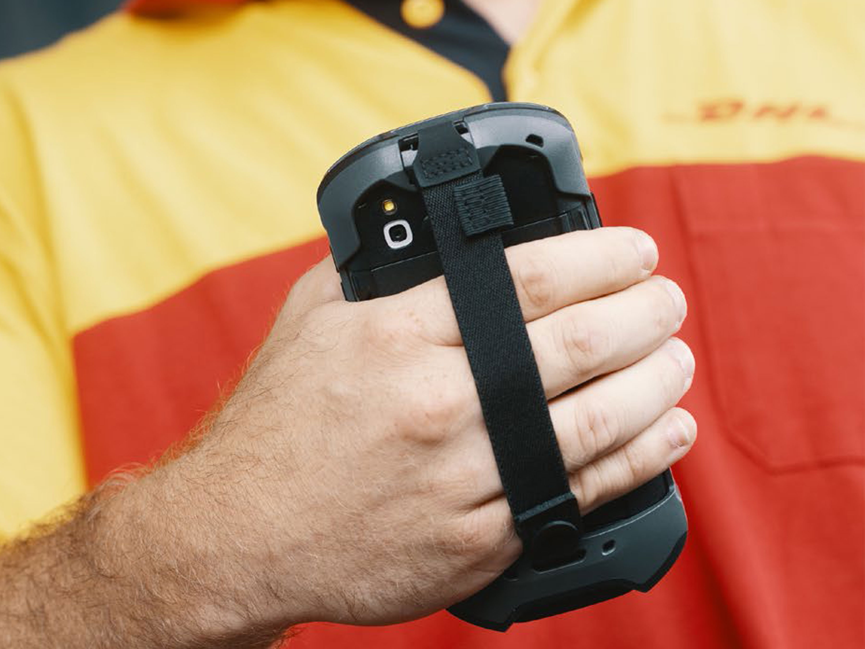 DHL employee holding a scanner