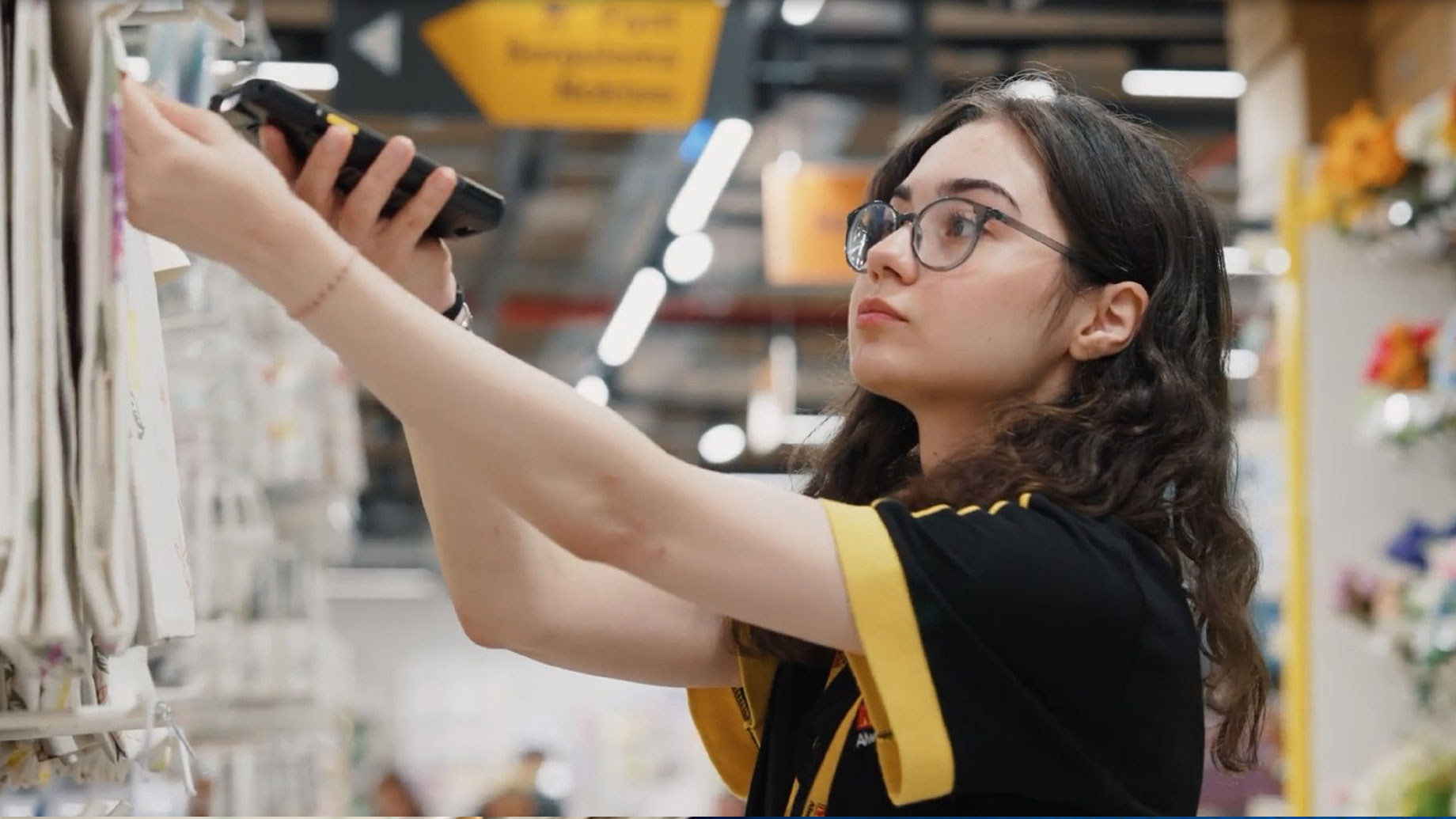 Mr. DIY employee scanning item with Zebra Scanner