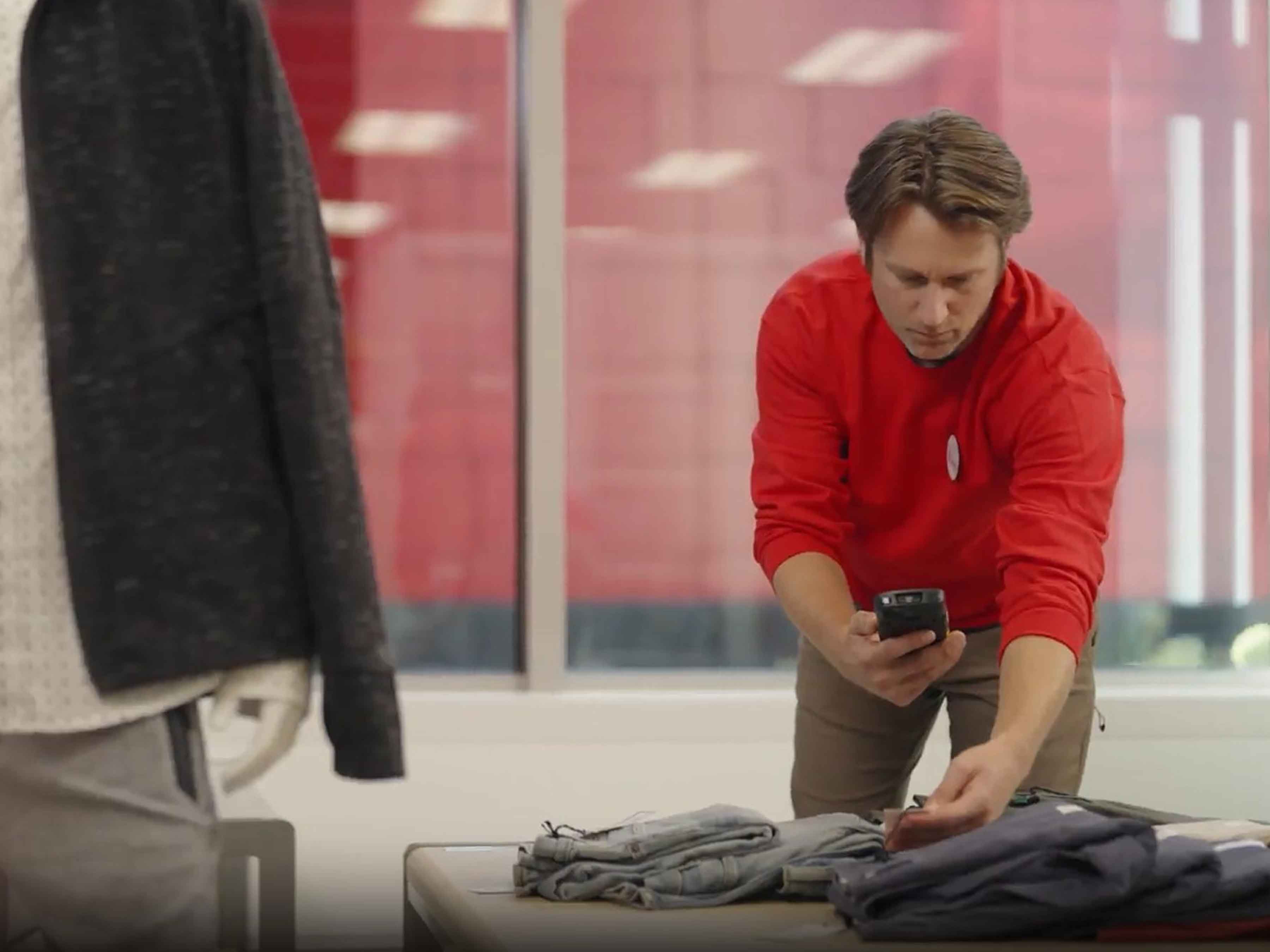 Target employee scanning a tag