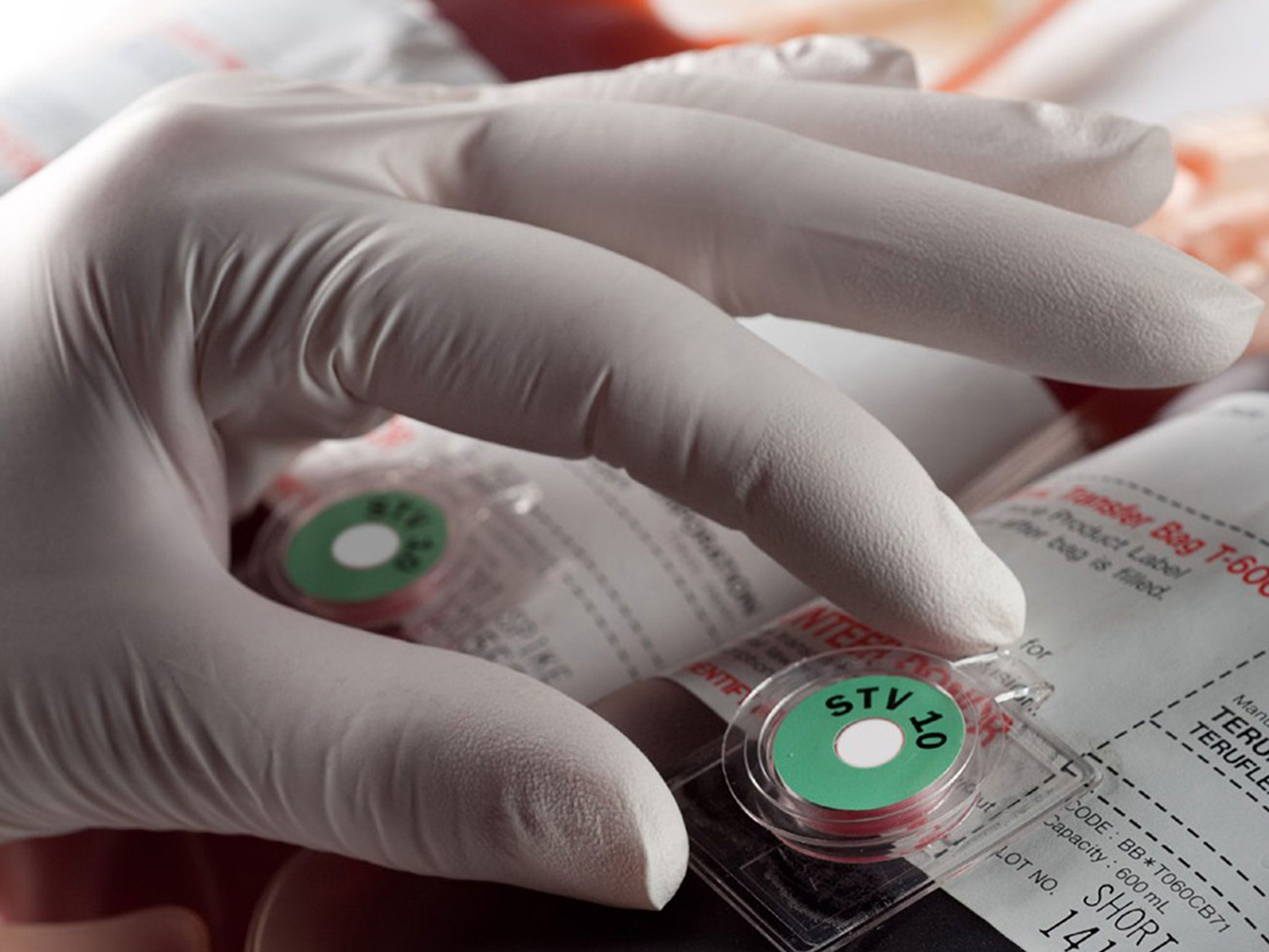 Personnel using a blood temperature indicators