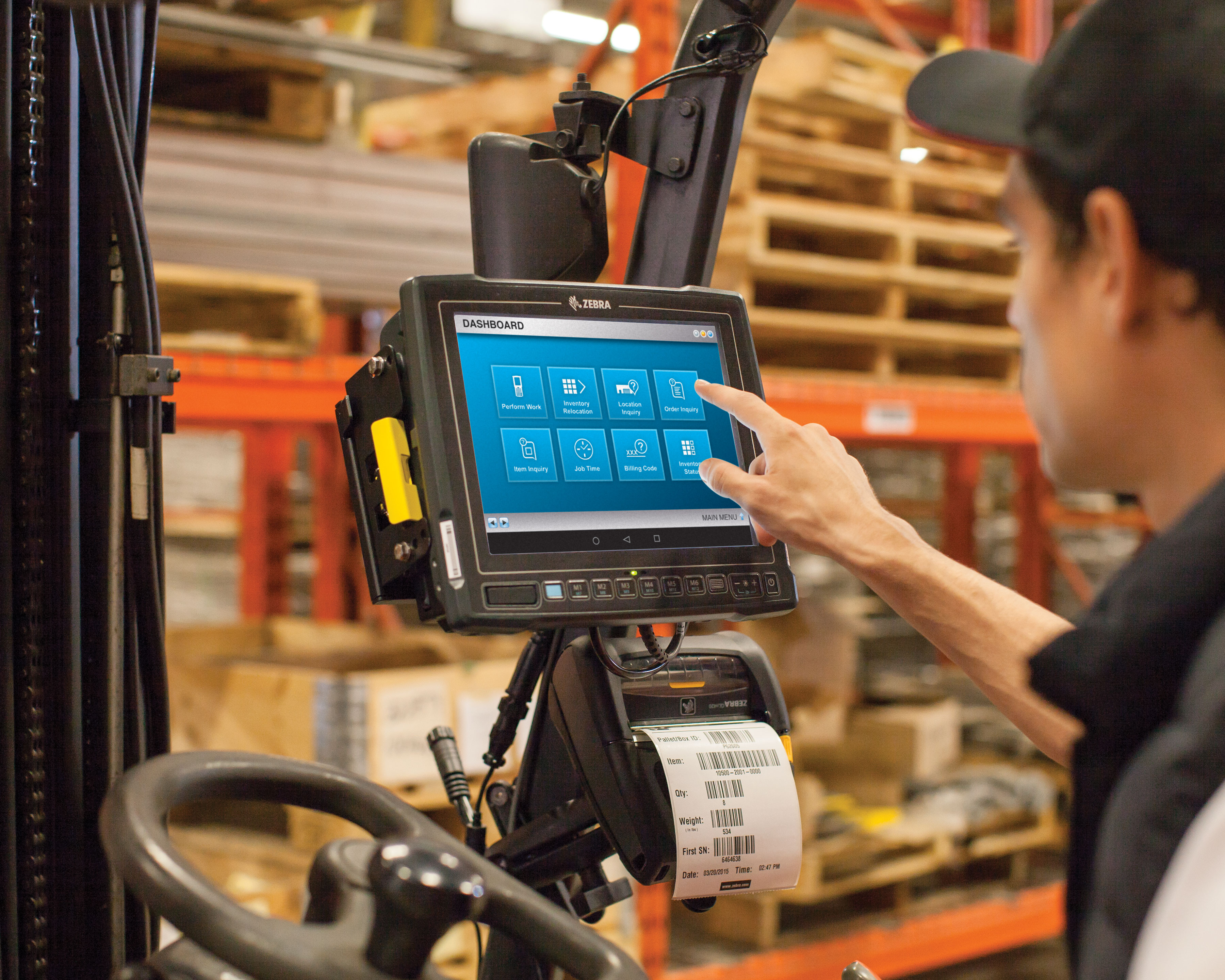 VC80x App Warehouse Forklift Data Entry 5x4 3600 Zebra VC80x mobile computer mounted to a warehouse forklift is being used by the driver to enter data
