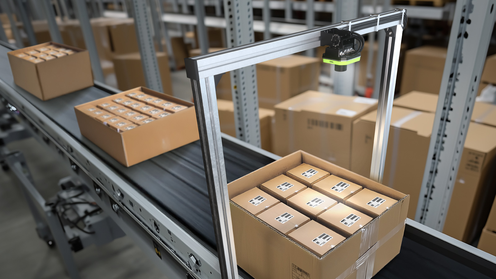 A fixed industrial scanner in a warehouse scans labels on cardboard boxes as they move along a conveyor belt.