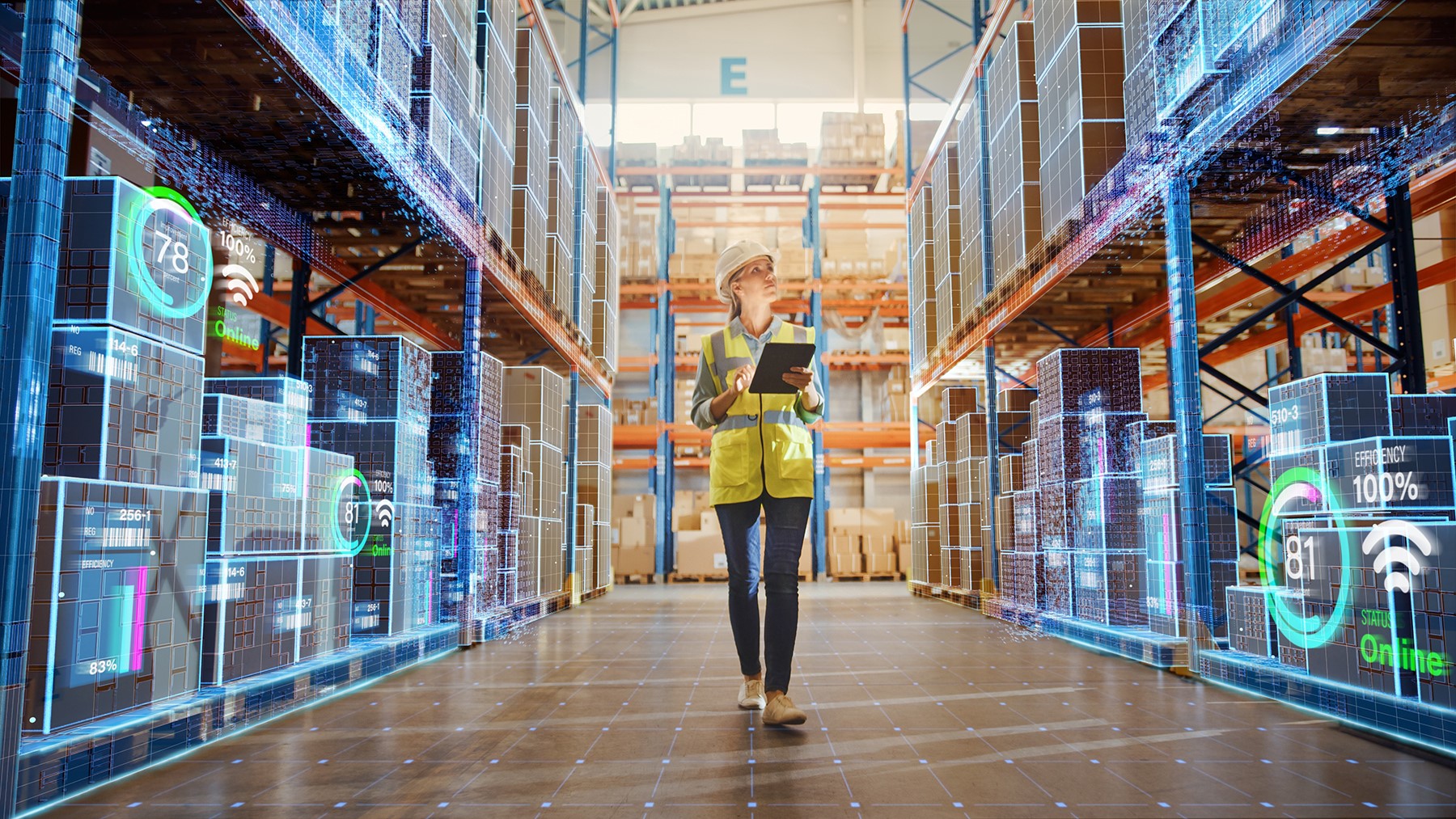 A woman walks down a warehouse aisle