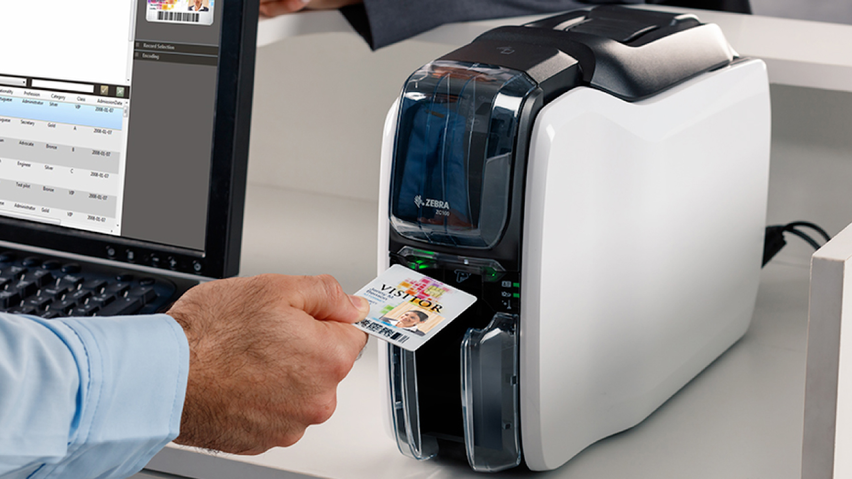 Zebra card printer printing an ID badge.