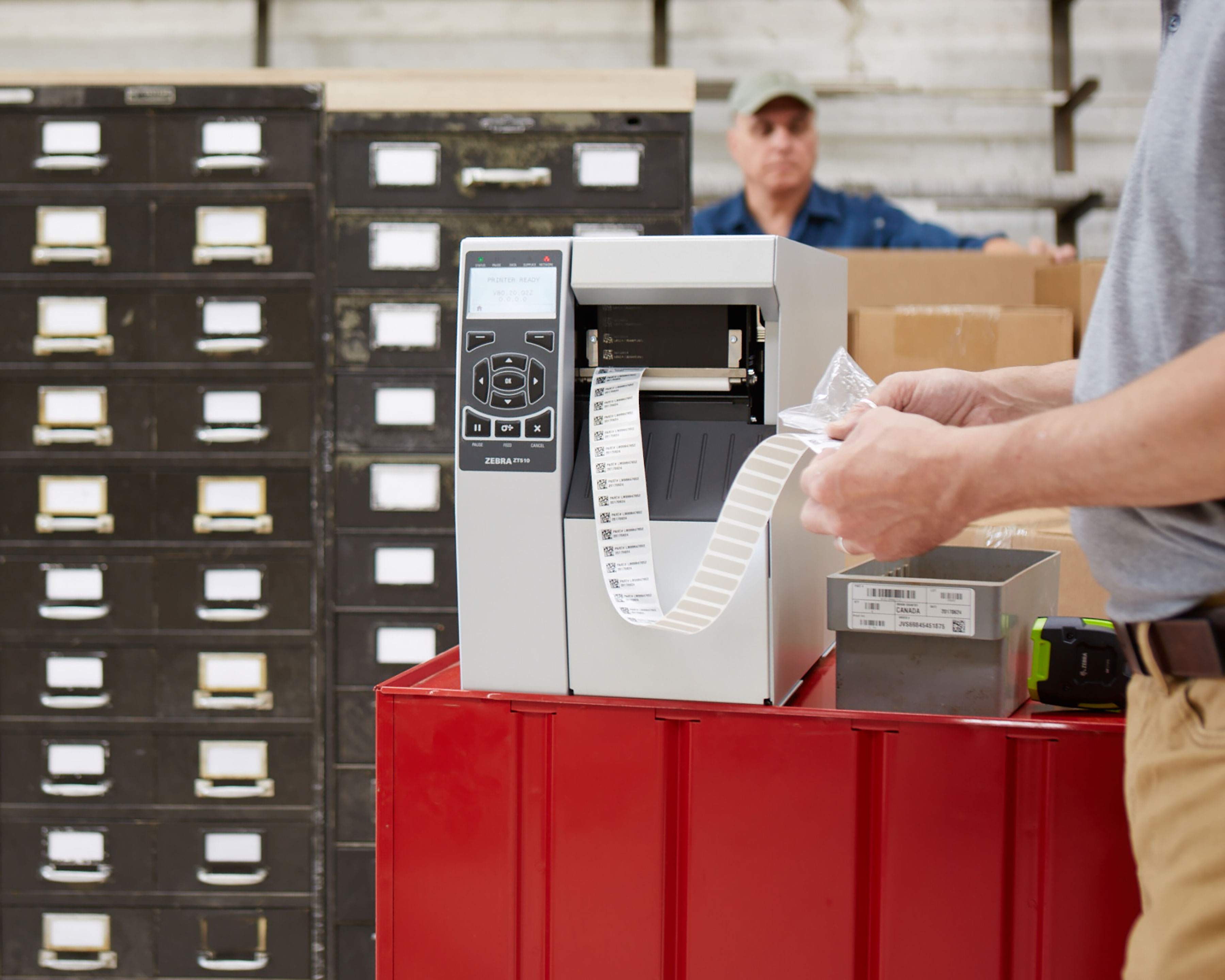 ZT510 on a desk in a warehouse with a label