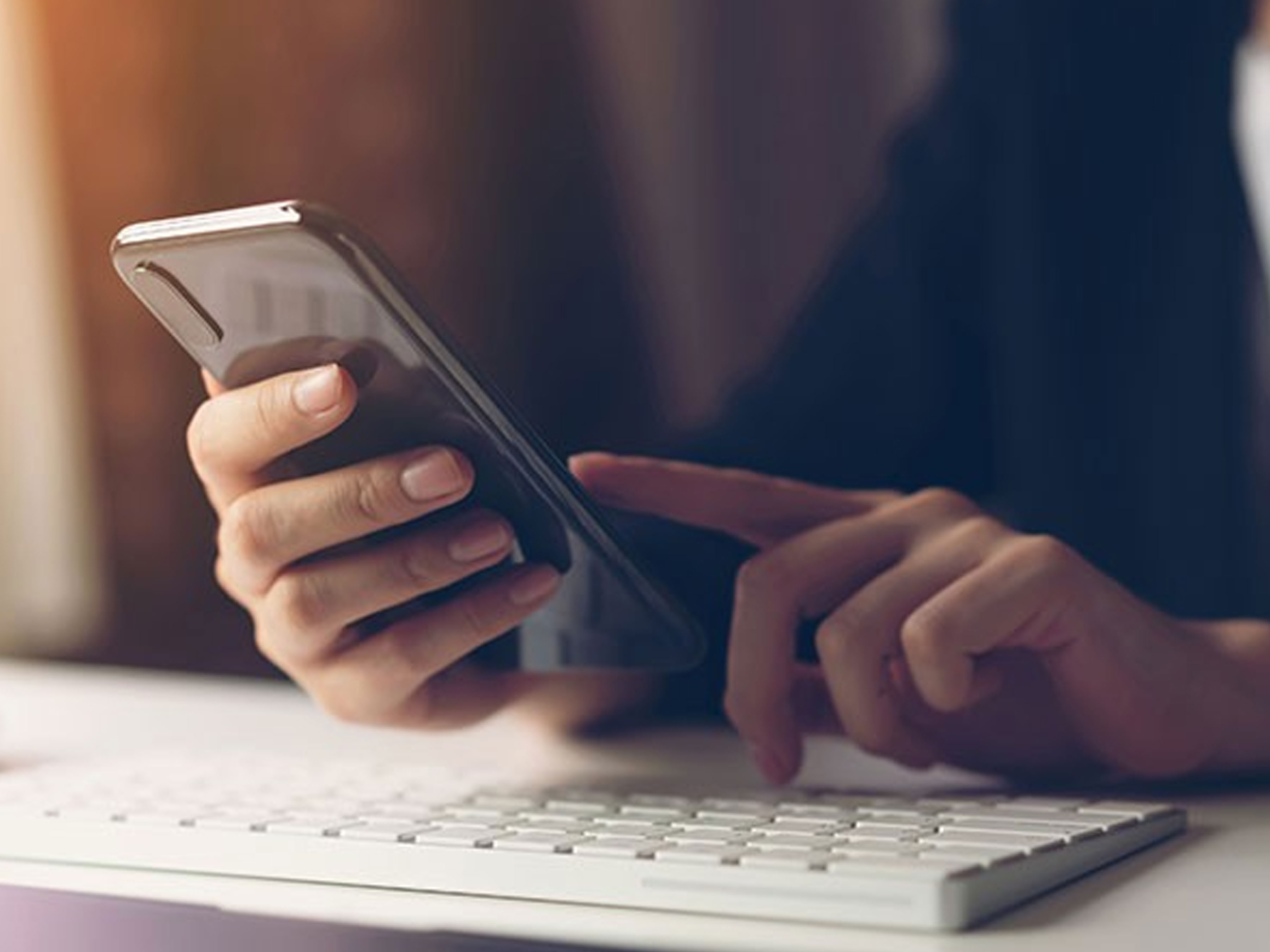 A person holds a smartphone