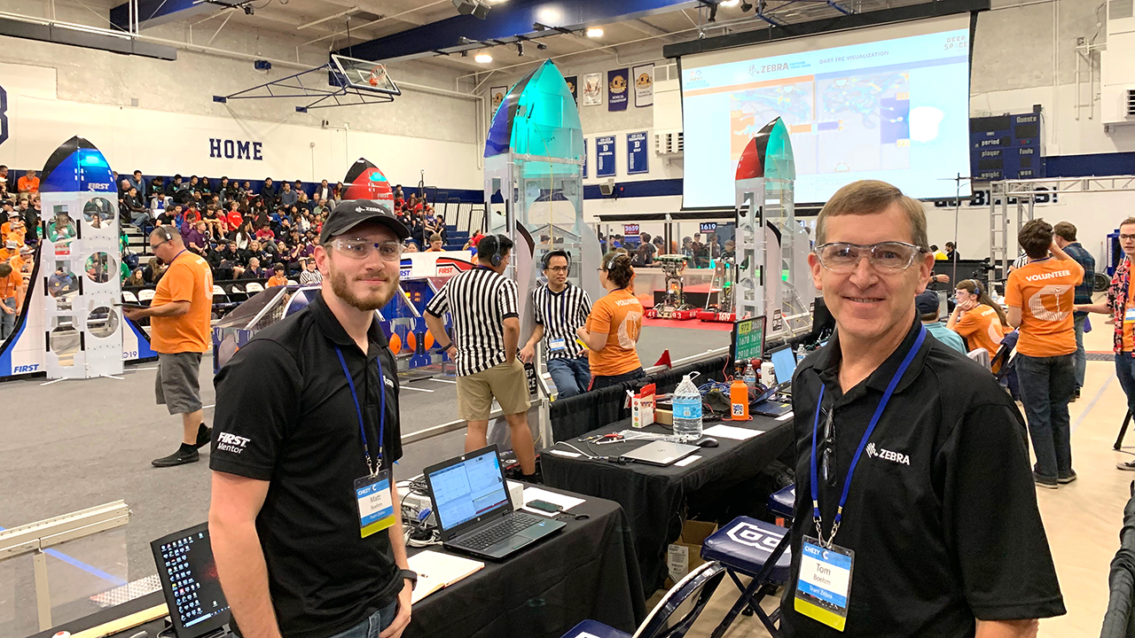 Zebra employees and FIRST Robotics mentors Matt Boehm and Tom Boehm at an off-season competition