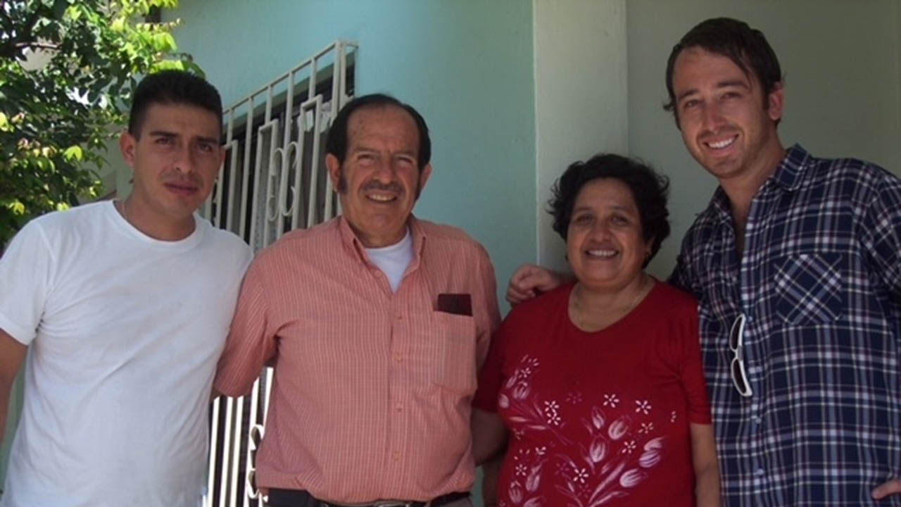 Zebra corporate lawyer Paul Borovay with his host family in Ecuador during his tour with the U.S. Peace Corps