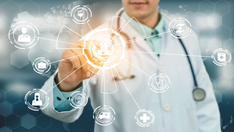 1126595583 Medical Healthcare Concept - Doctor in hospital with digital medical icons graphic banner showing symbol of medicine, medical care people, emergency service network, doctor data of patient health.