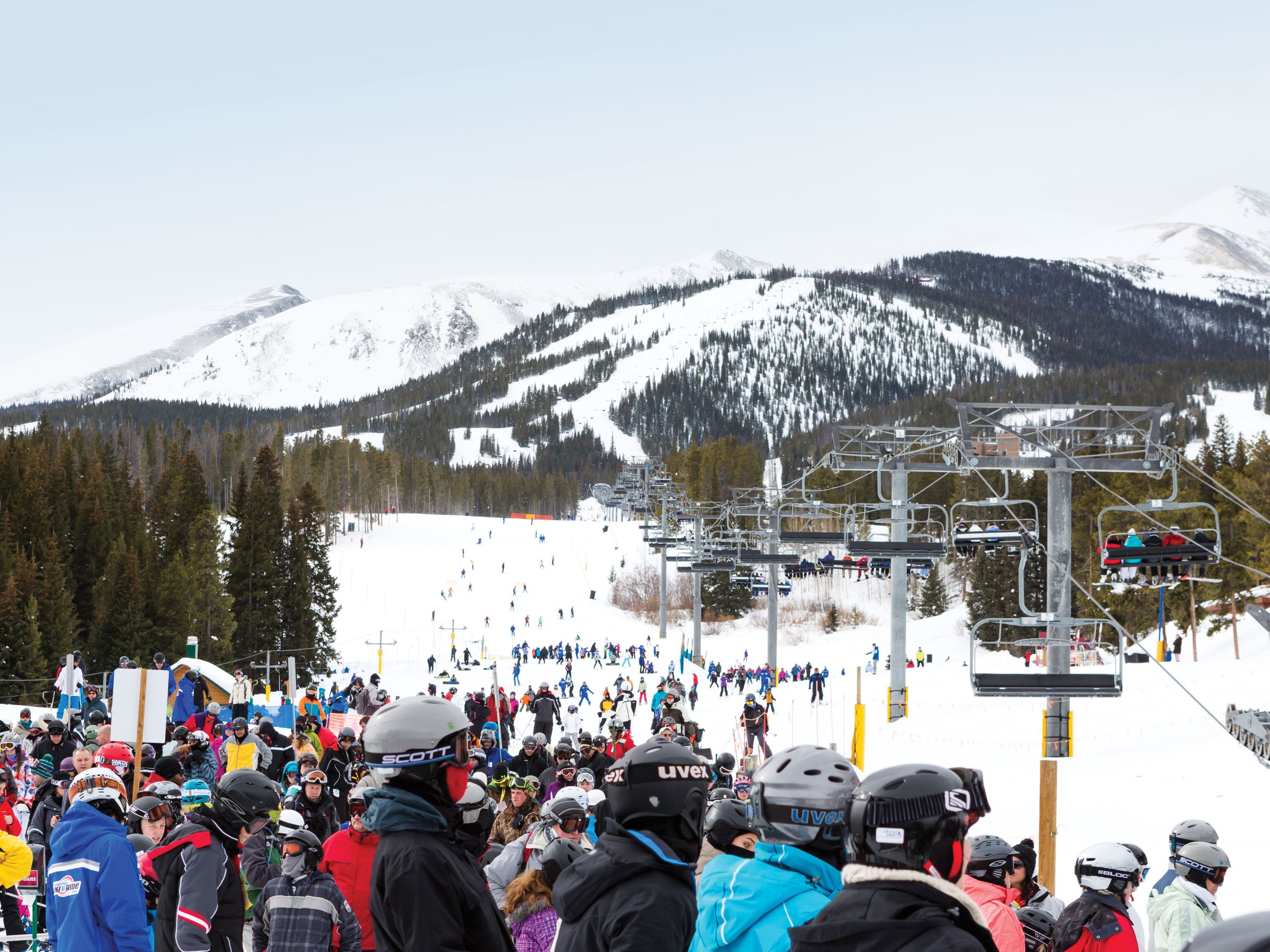 Image of a busy ski slope in the winter