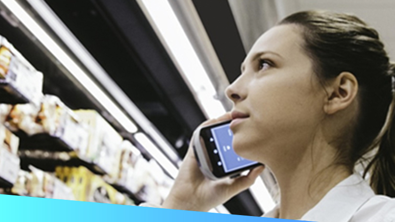 A store associate calls a customer to ask about how to substitute items during online order "picking"