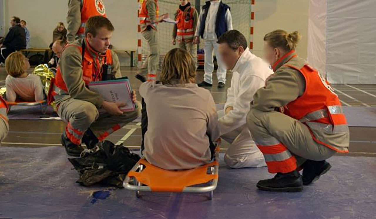 French Red Cross first responders triage a patient