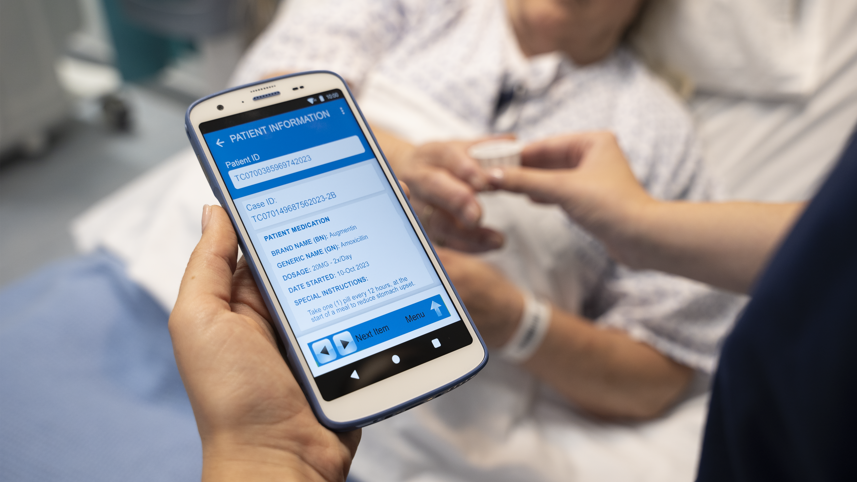 Zebra handheld mobile computer being used for medication administration