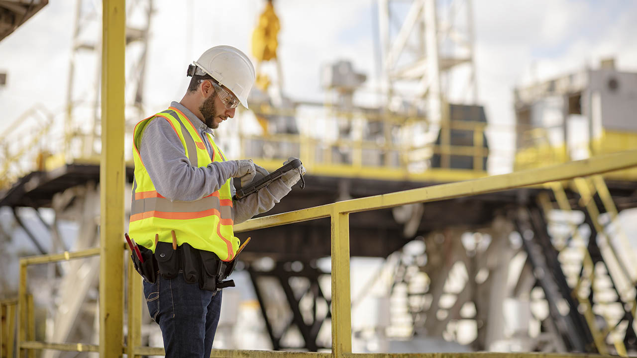 A field worker looks at his Zebra XPAD L10 tablet screen