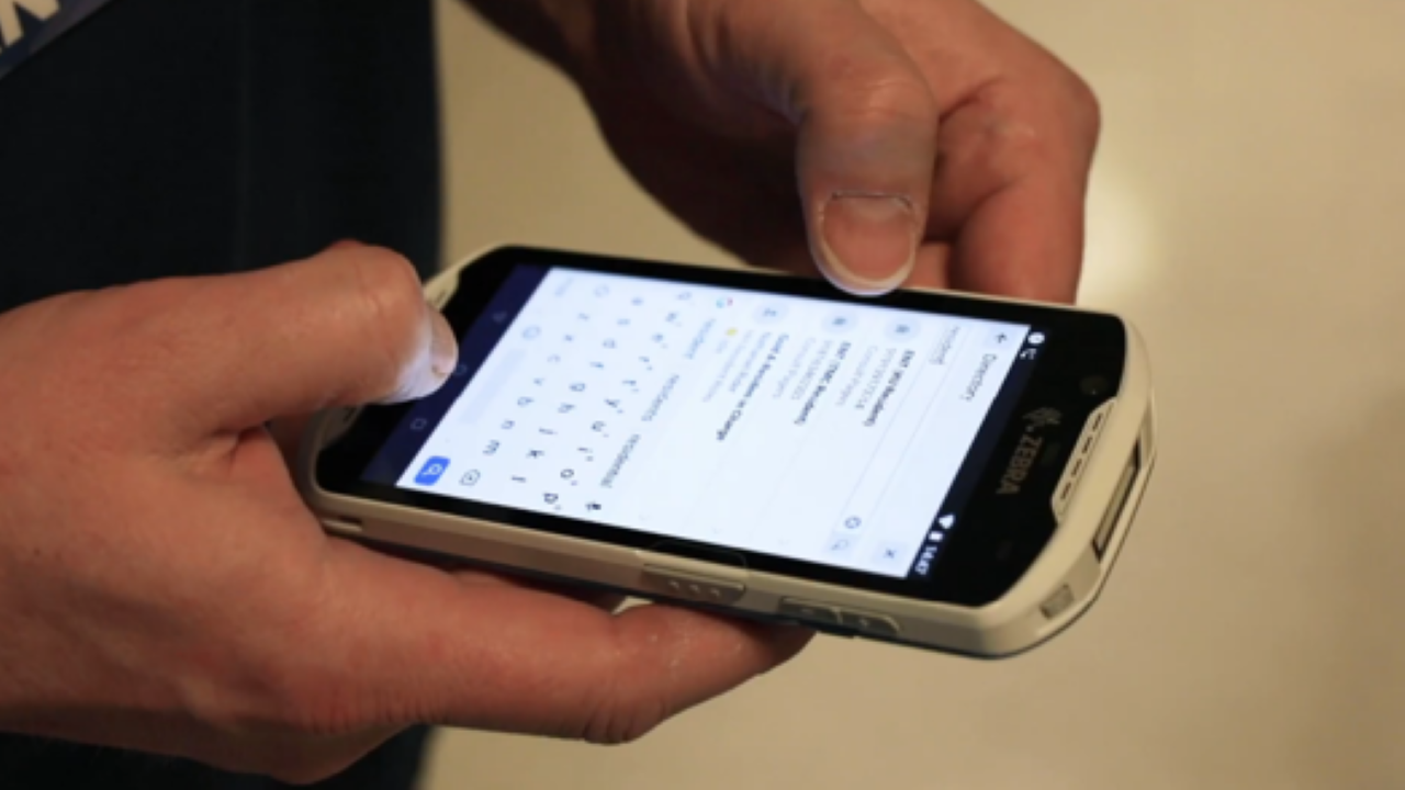 A clinical smartphone is used by a doctor
