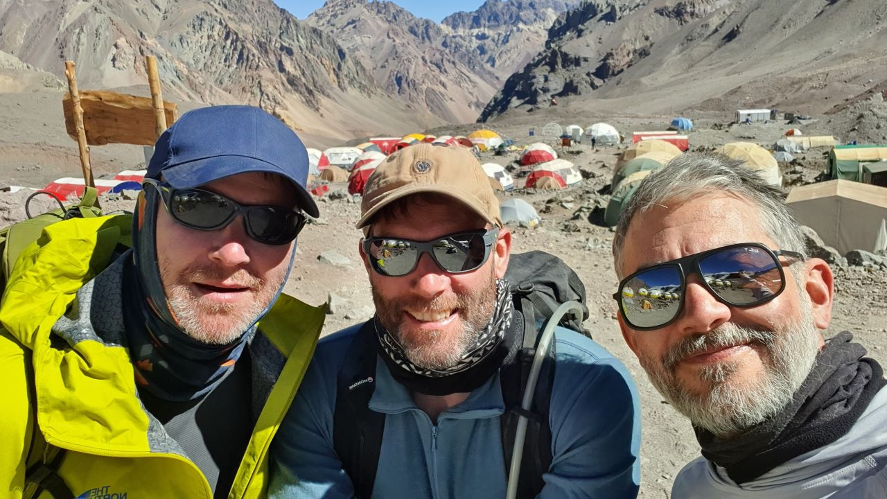 Zebra's "Three Amigos" smiling after reaching base camp on the descent from Mount Aconcagua in February 2020