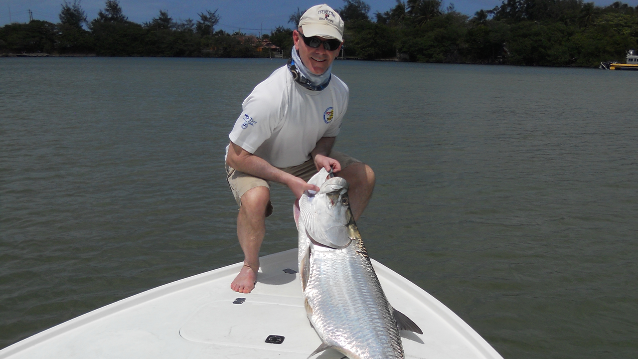 Zebra’s Senior Director and Corporate Counsel Todd Beck shows off a fish he caught on a recent expedition in Puerto Rico.
