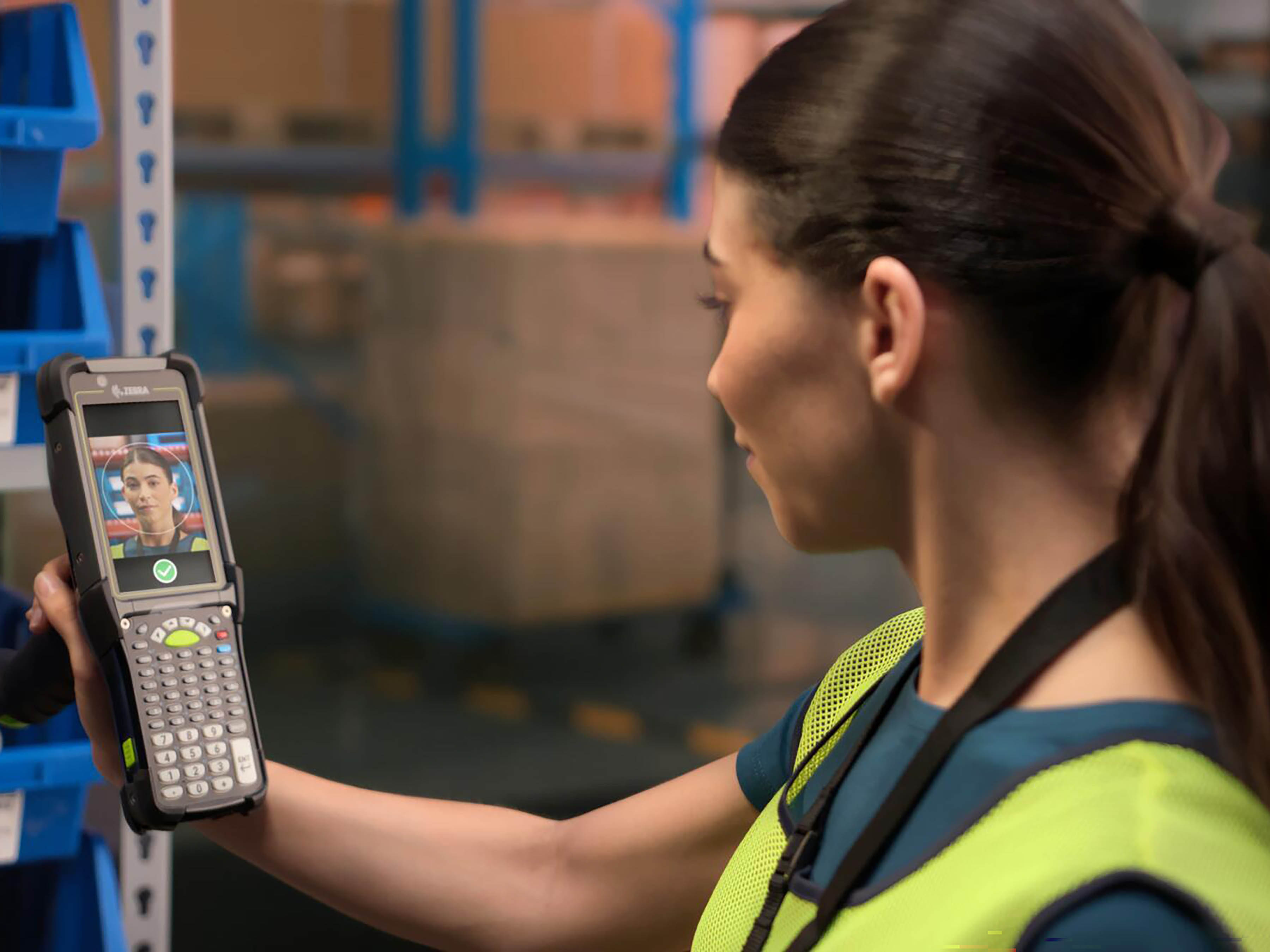 A warehouse associate uses Identity Guardian to authenticate on a shared Zebra mobile device