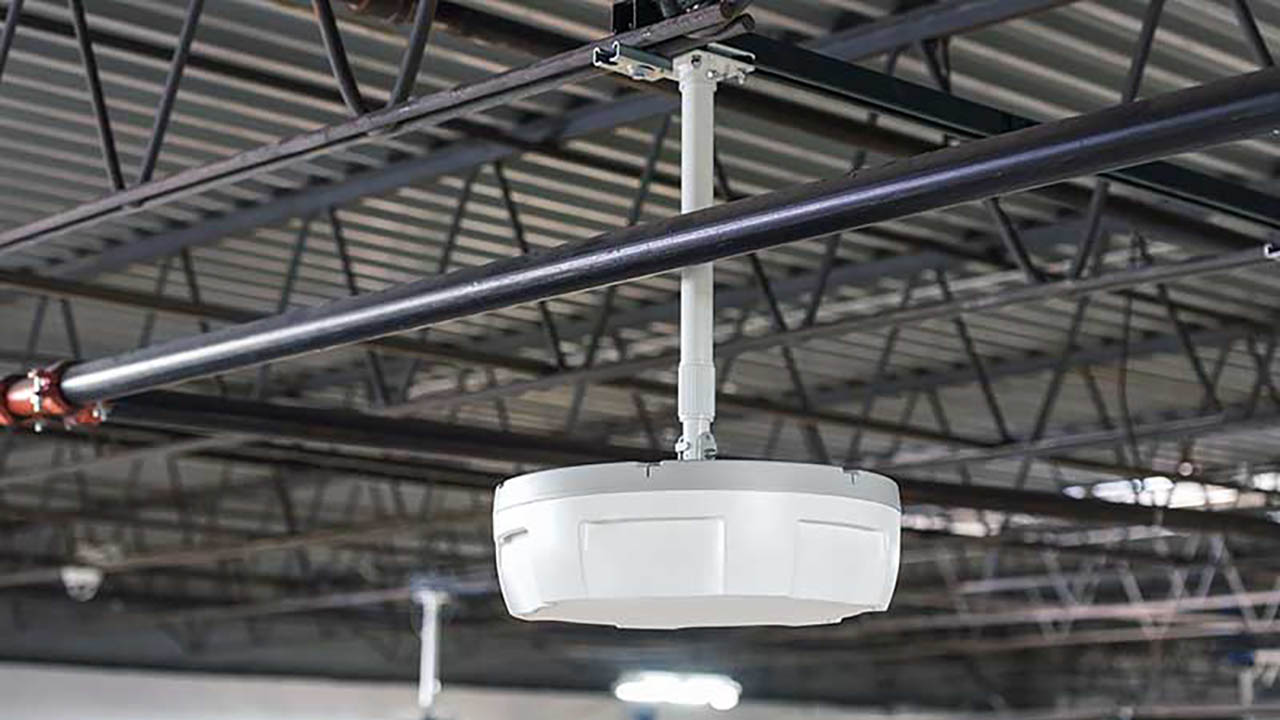 An RFID reader on a warehouse ceiling