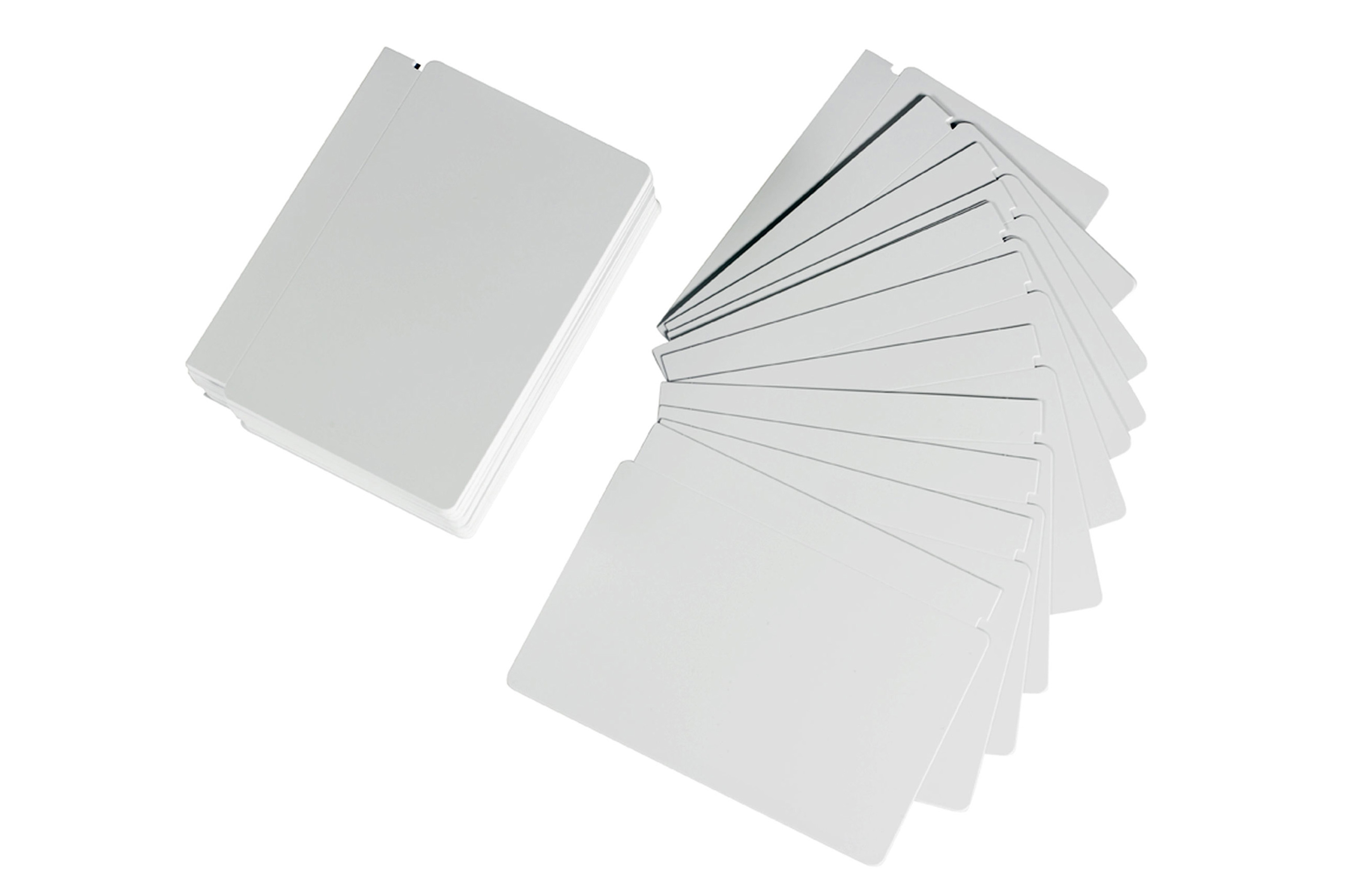 Stack of and fanned out white cards supplies.