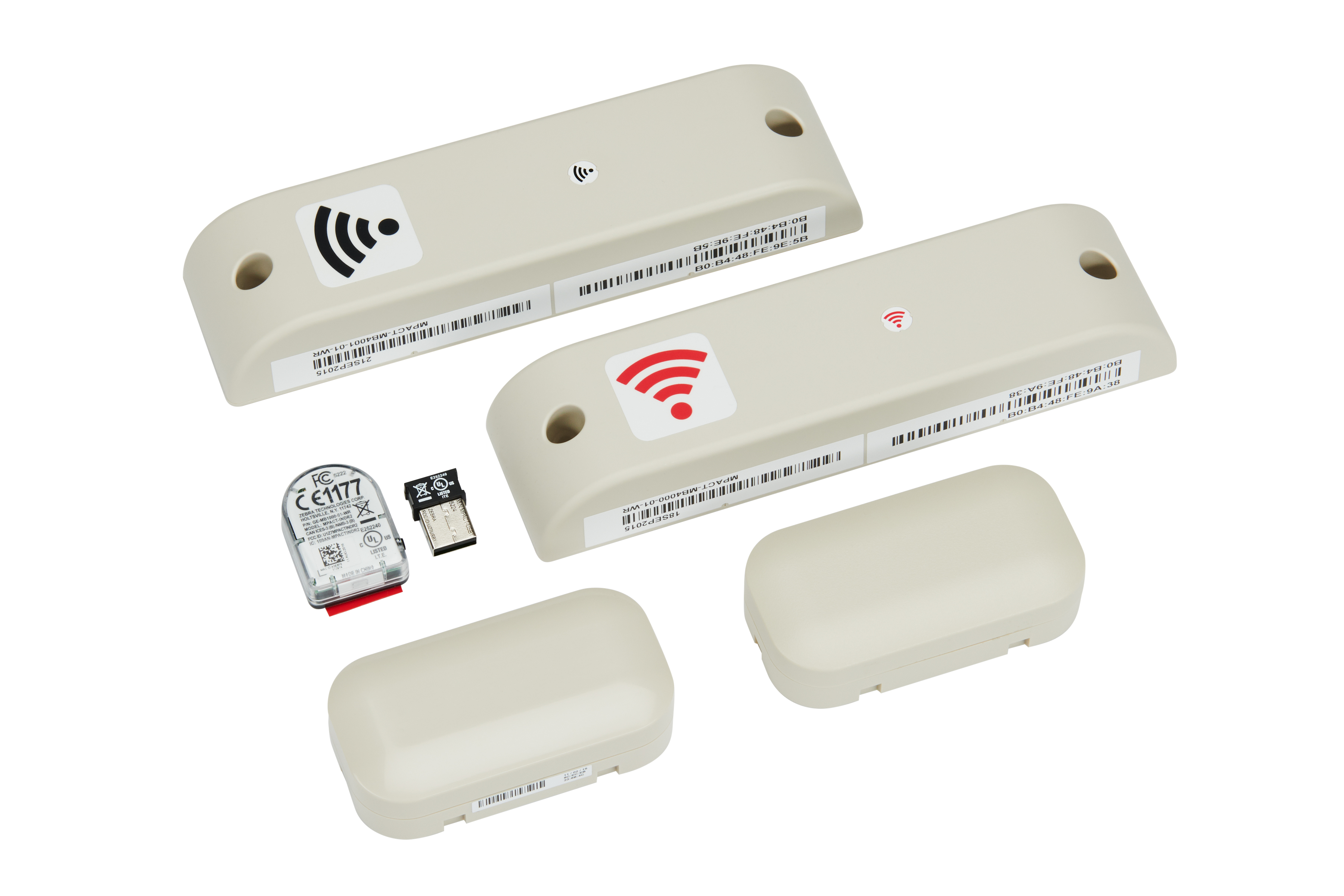 Group of Zebra Bluetooth low energy locating devices in white.