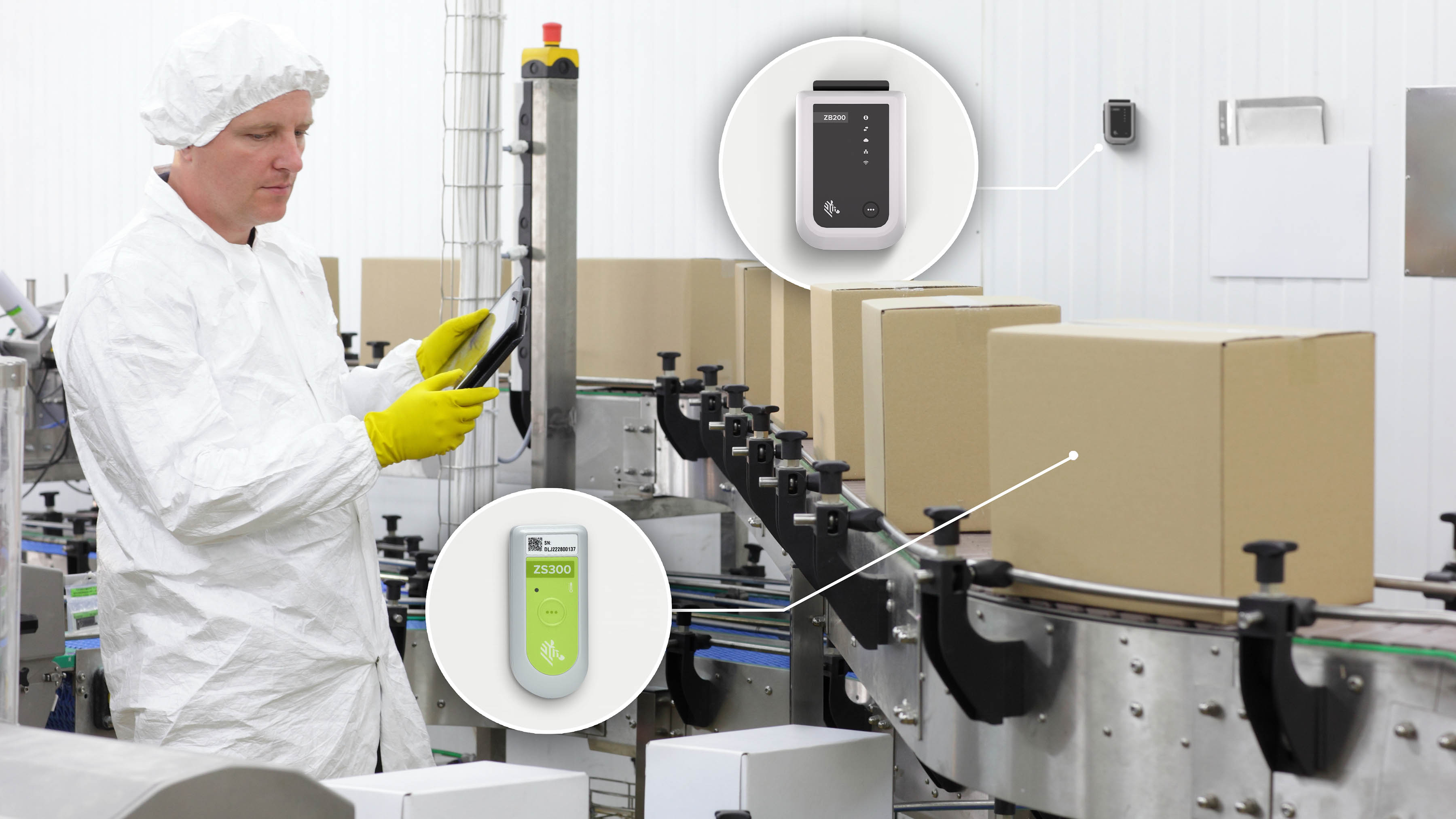 Factory worker monitoring packaging line with Zebra environmental sensors