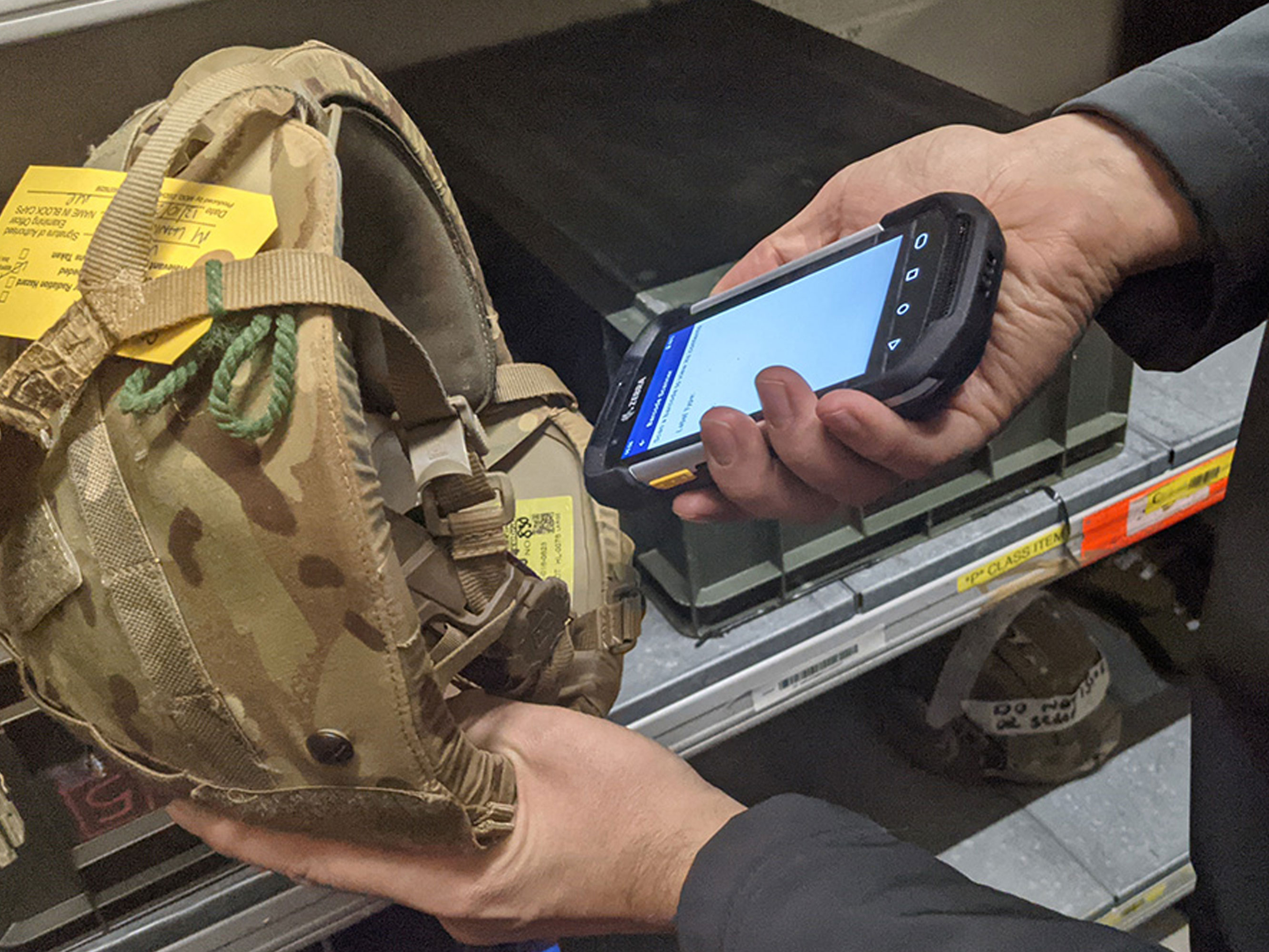 public sector photography website defence handheld in hand scanning helmet