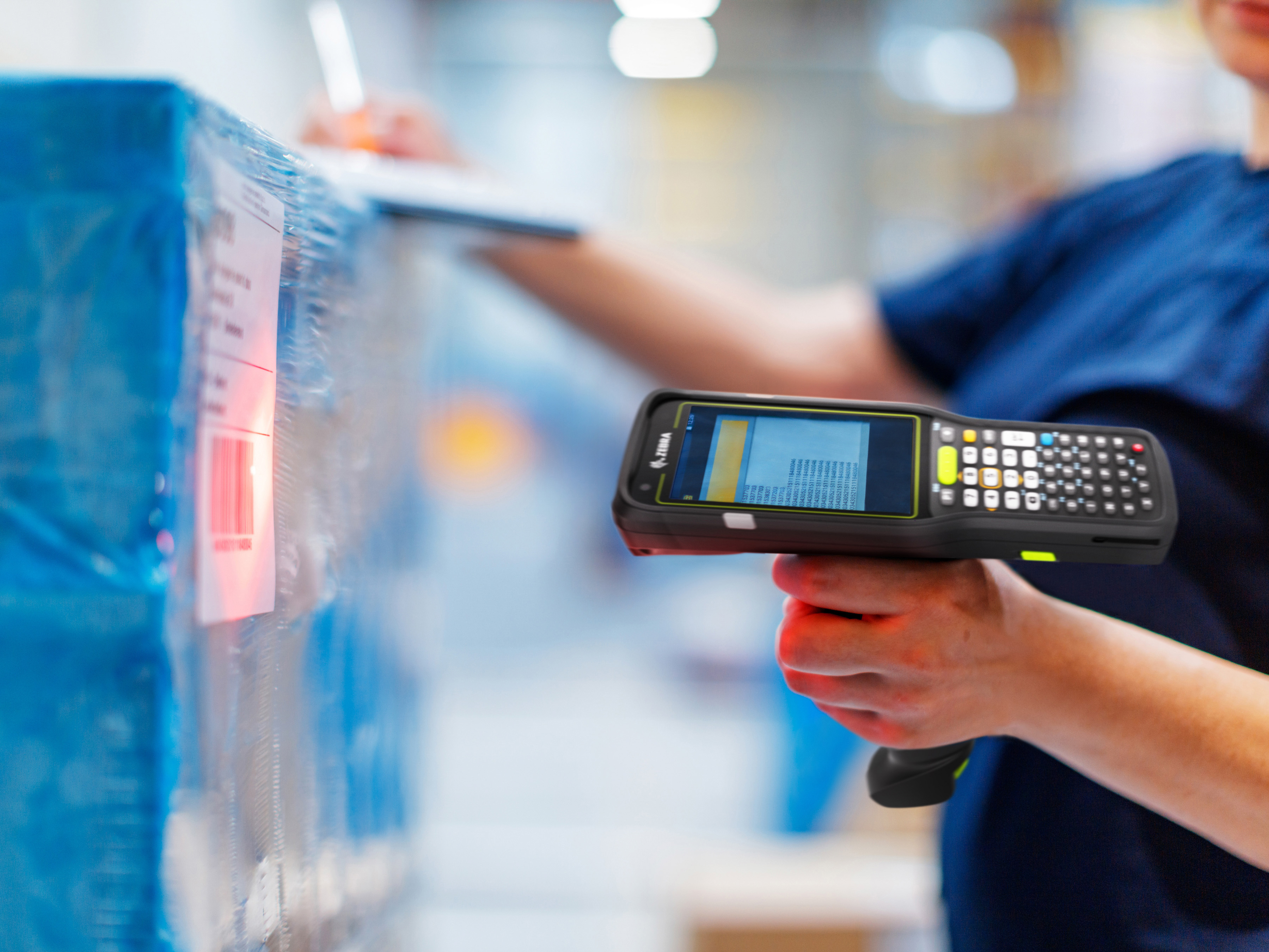 Label being scanned by an employee with a Zebra scanner