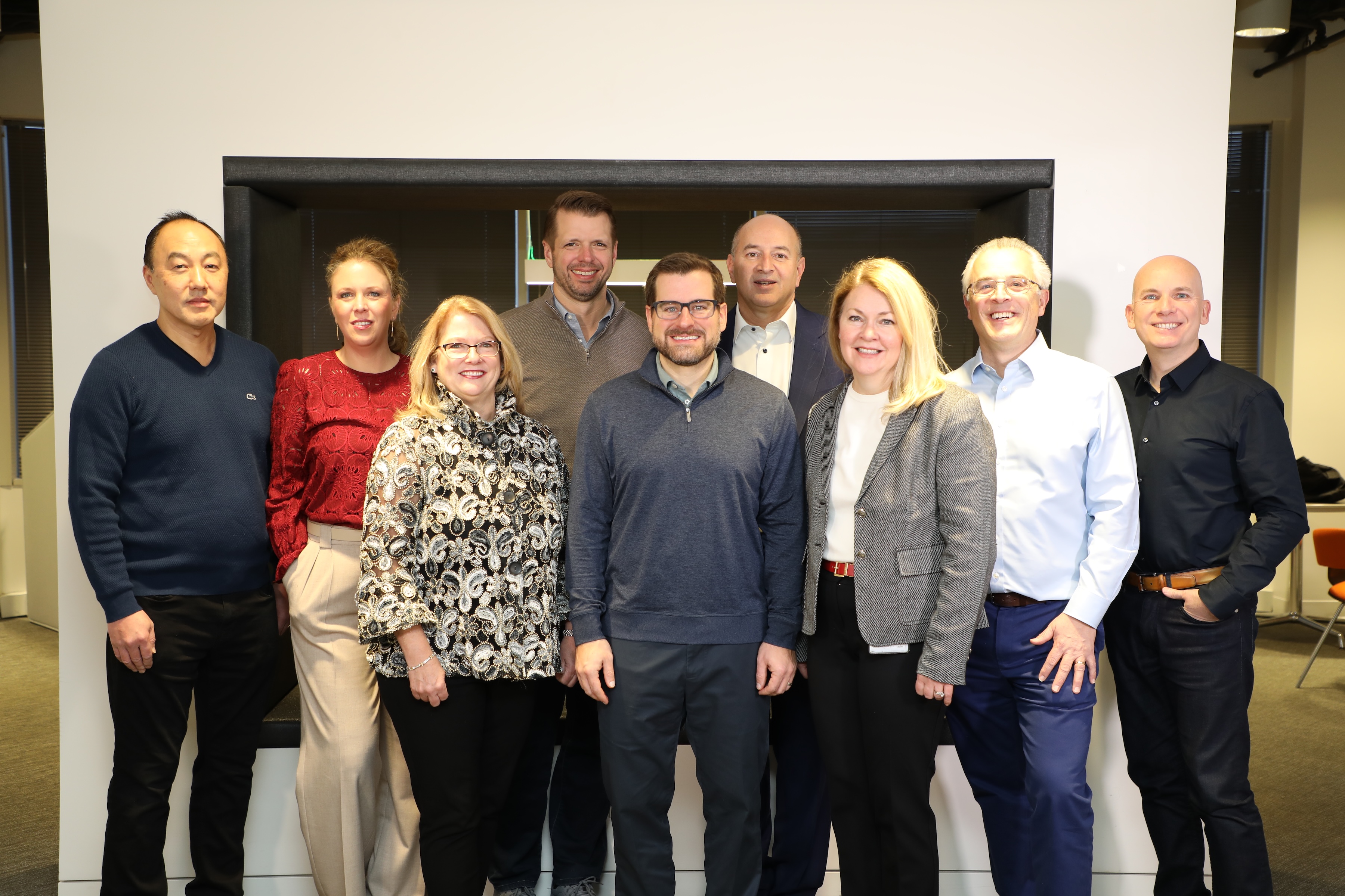 The Zebra Executive Leadership Team poses for a group photo at Zebra's corporate headquarters.
