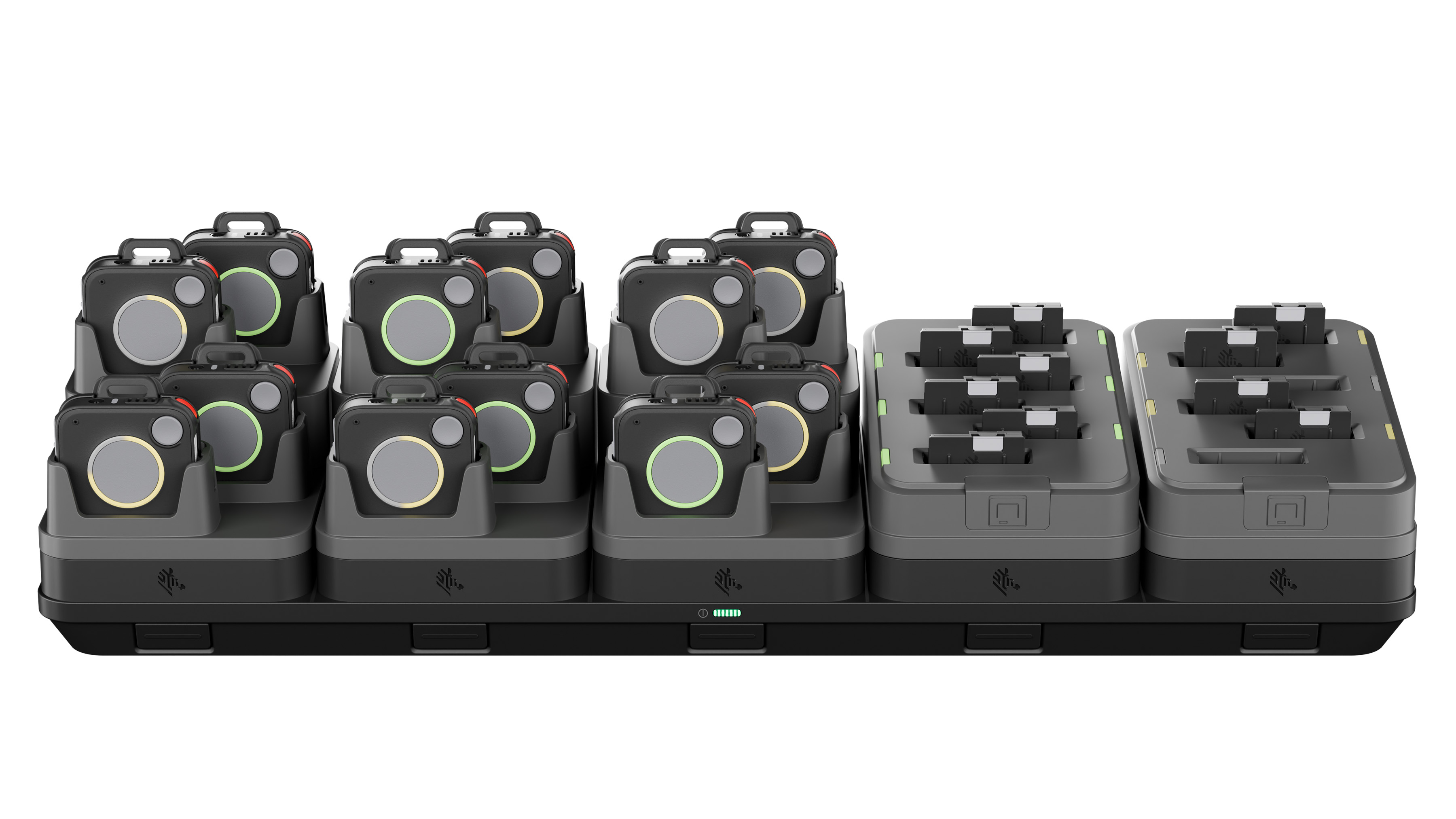 Zebra wearable mobile computer devices charging on a sharecradle dock.