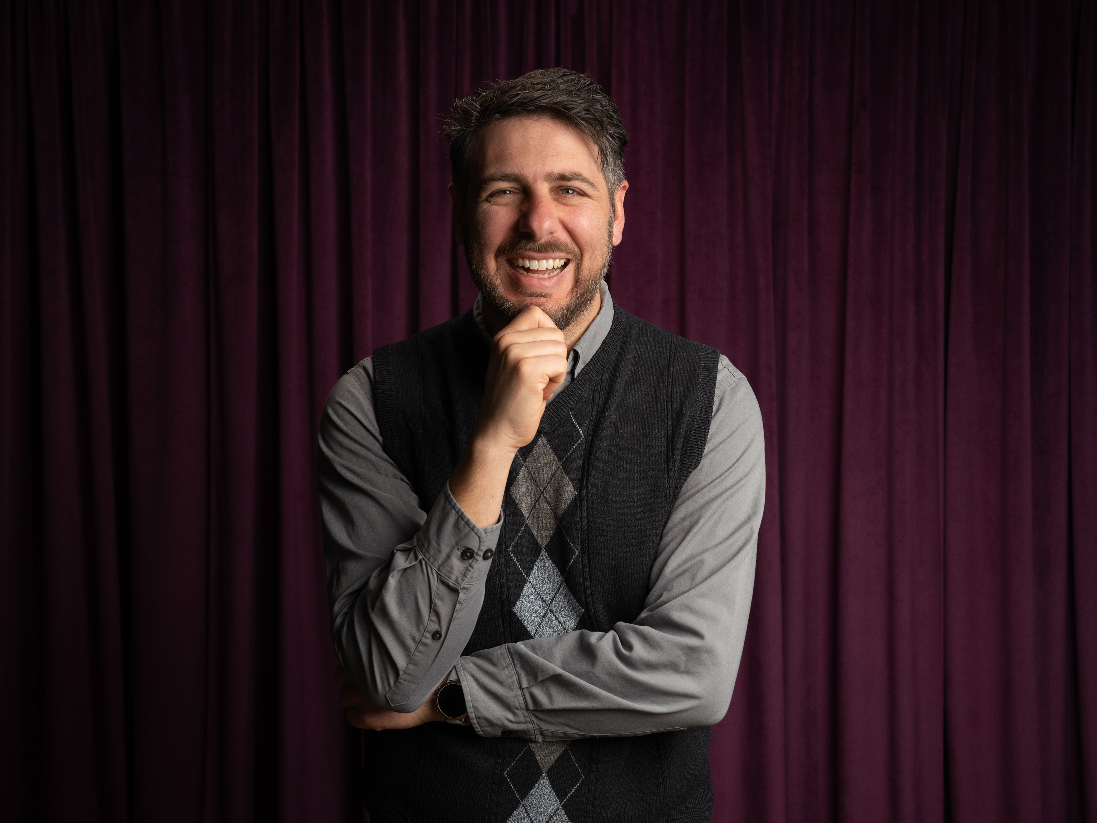 Brian Zebra headshot on purple background