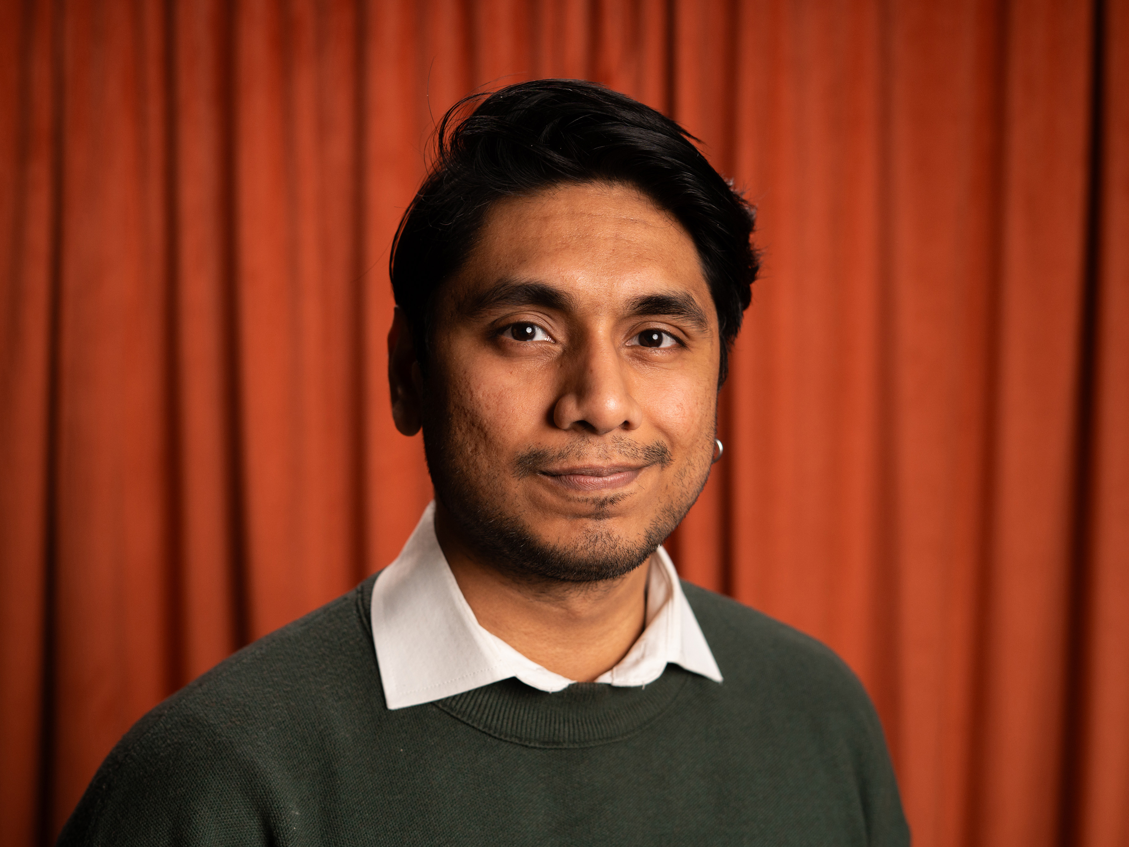 Md Zakaria Cowdhury Risart Zebra headshot on orange background