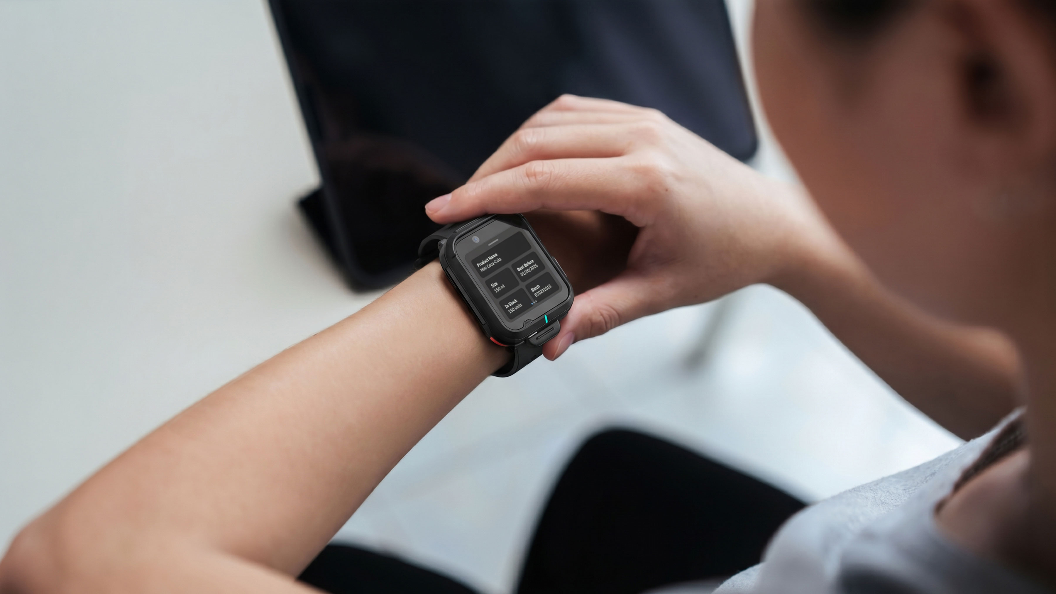 Photo of a closeup of a retail worker using a WS301 with Workcloud Sync on the wrist. This image was generated with the assistance of AI tools and may not depict real people, places, or events.