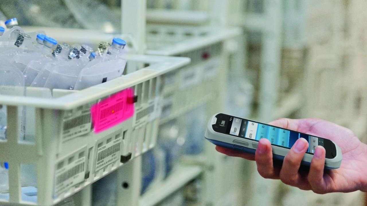 A Zebra TC52-HC clinical smartphone is use to scan specimen collection tubes during an inventory count.