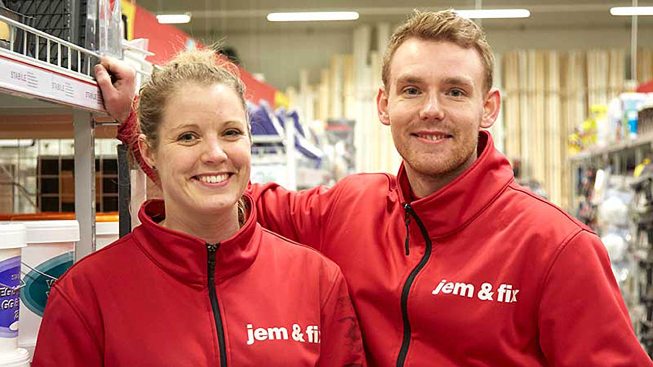 Two Jem and Fix retail associates smile for the camera