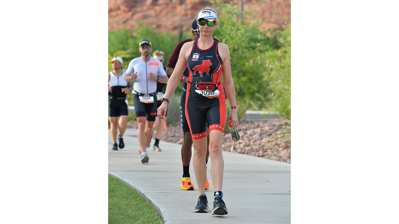 Lorna Hopkin hobbles along during the marathon portion of the Ironman World Championship competition